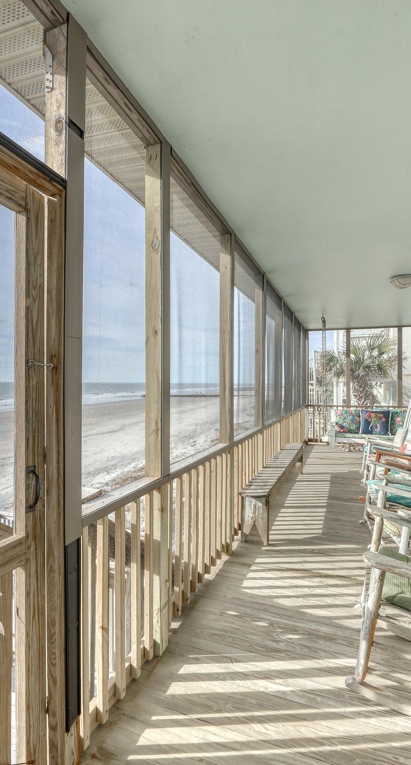 Raised oceanfront home with elevator & outdoor shower just steps from beach