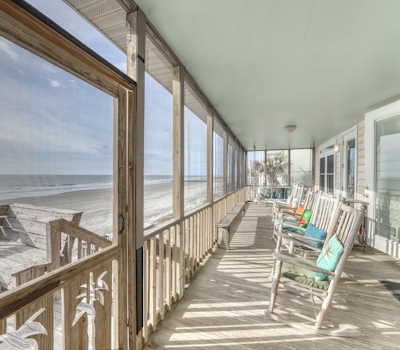 Raised oceanfront home with elevator & outdoor shower just steps from beach
