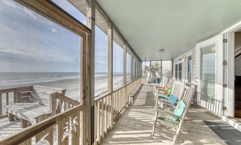 Raised oceanfront home with elevator & outdoor shower just steps from beach