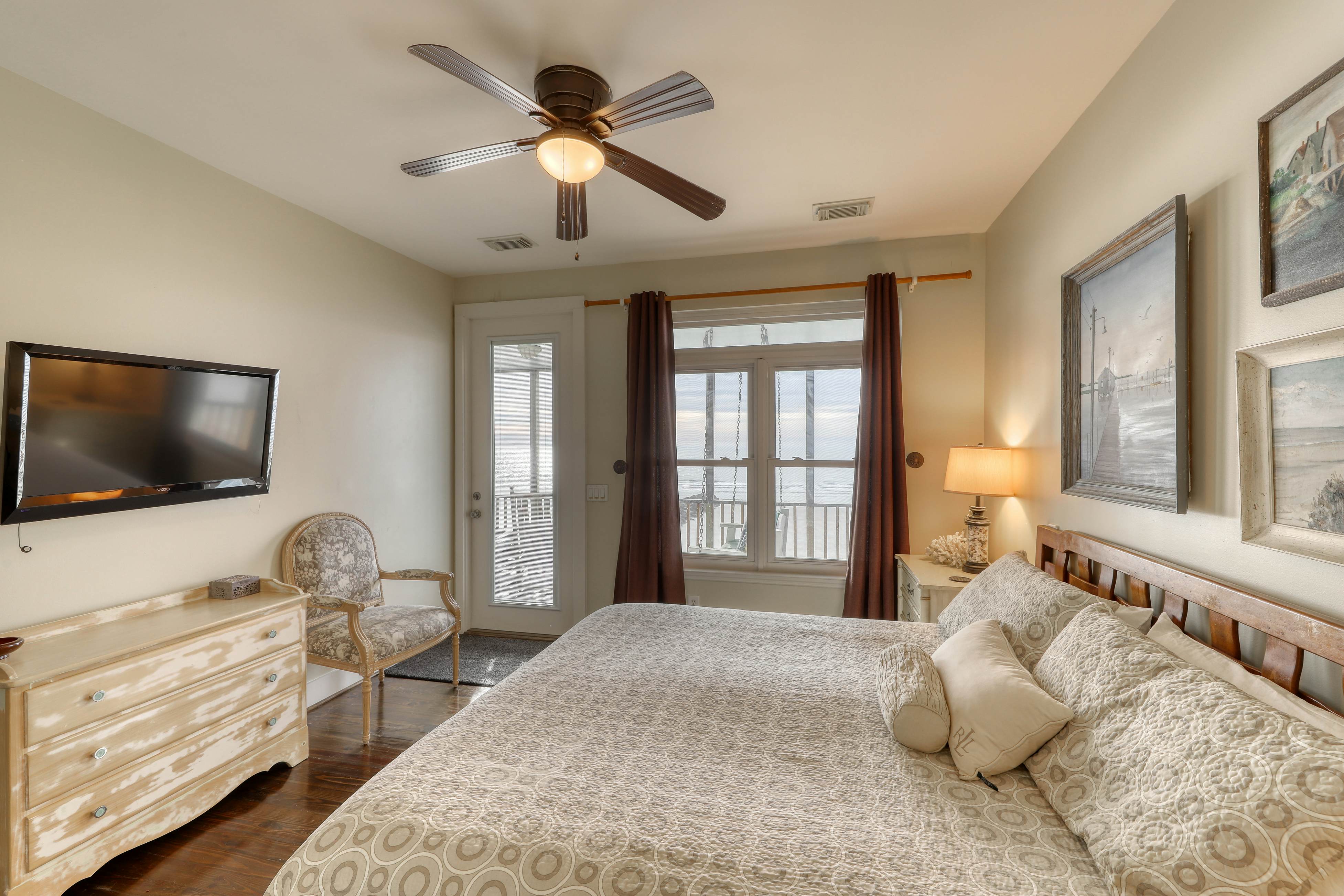 Raised oceanfront home with elevator & outdoor shower just steps from beach