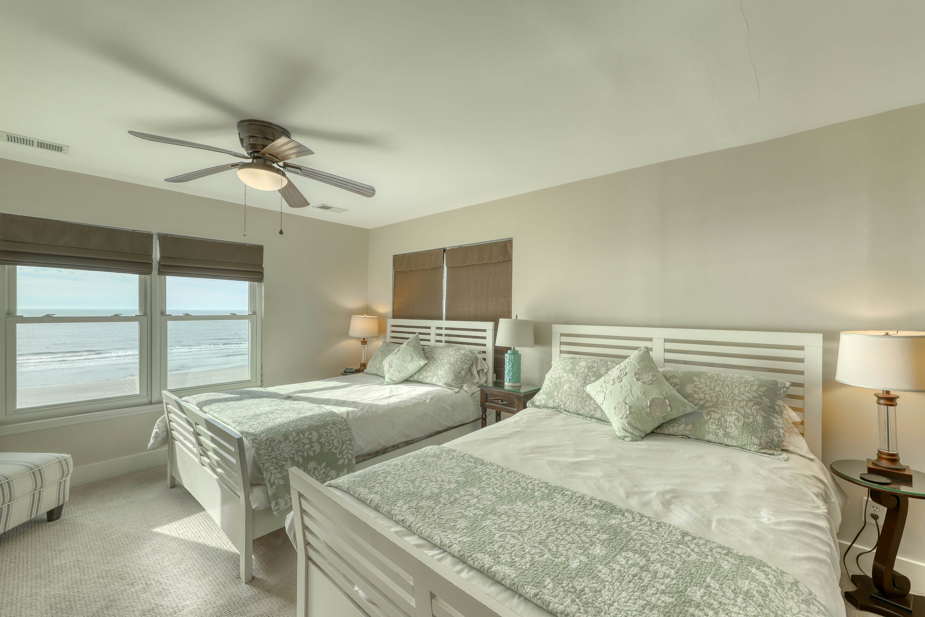 Raised oceanfront home with elevator & outdoor shower just steps from beach