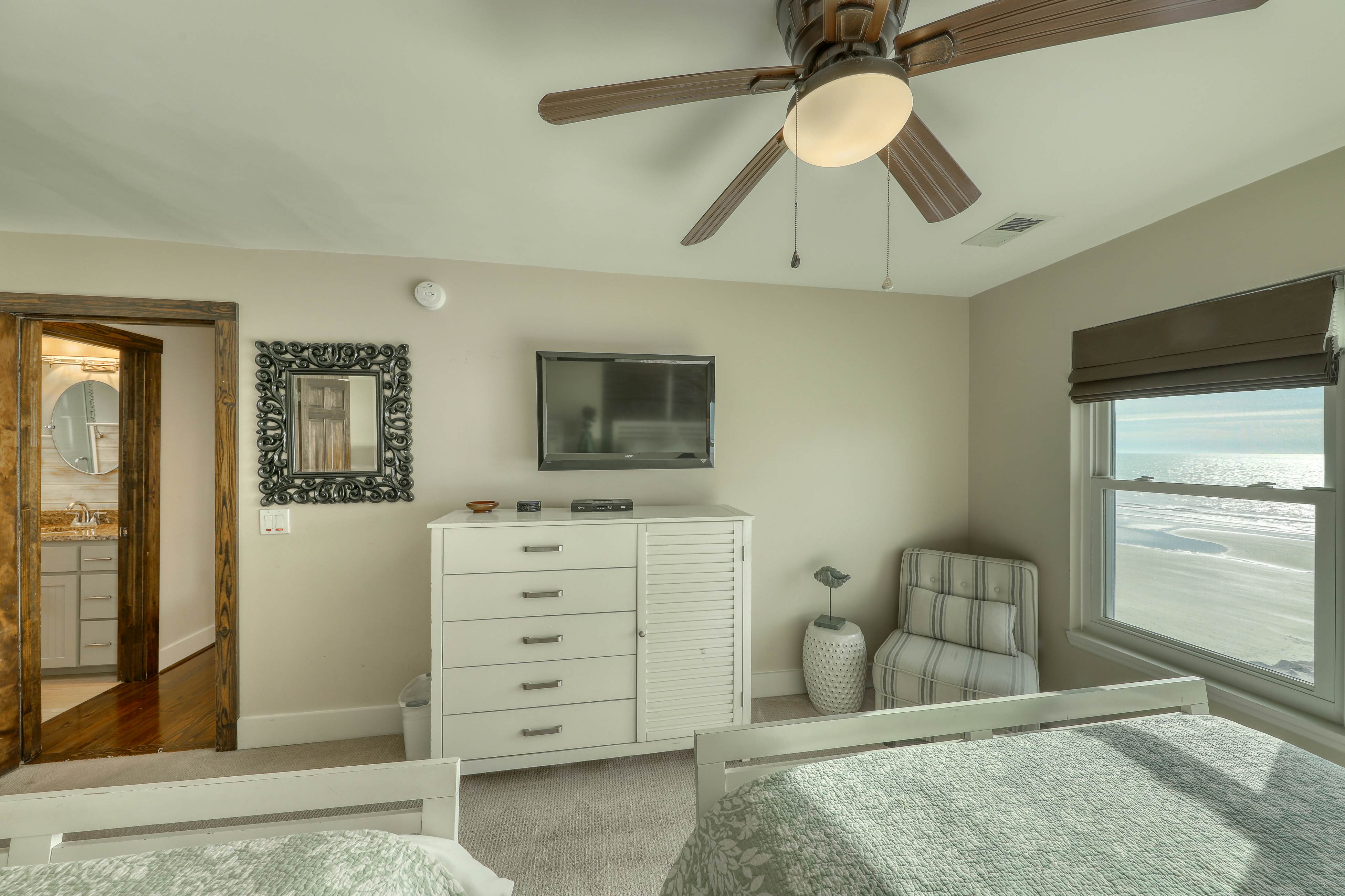 Raised oceanfront home with elevator & outdoor shower just steps from beach