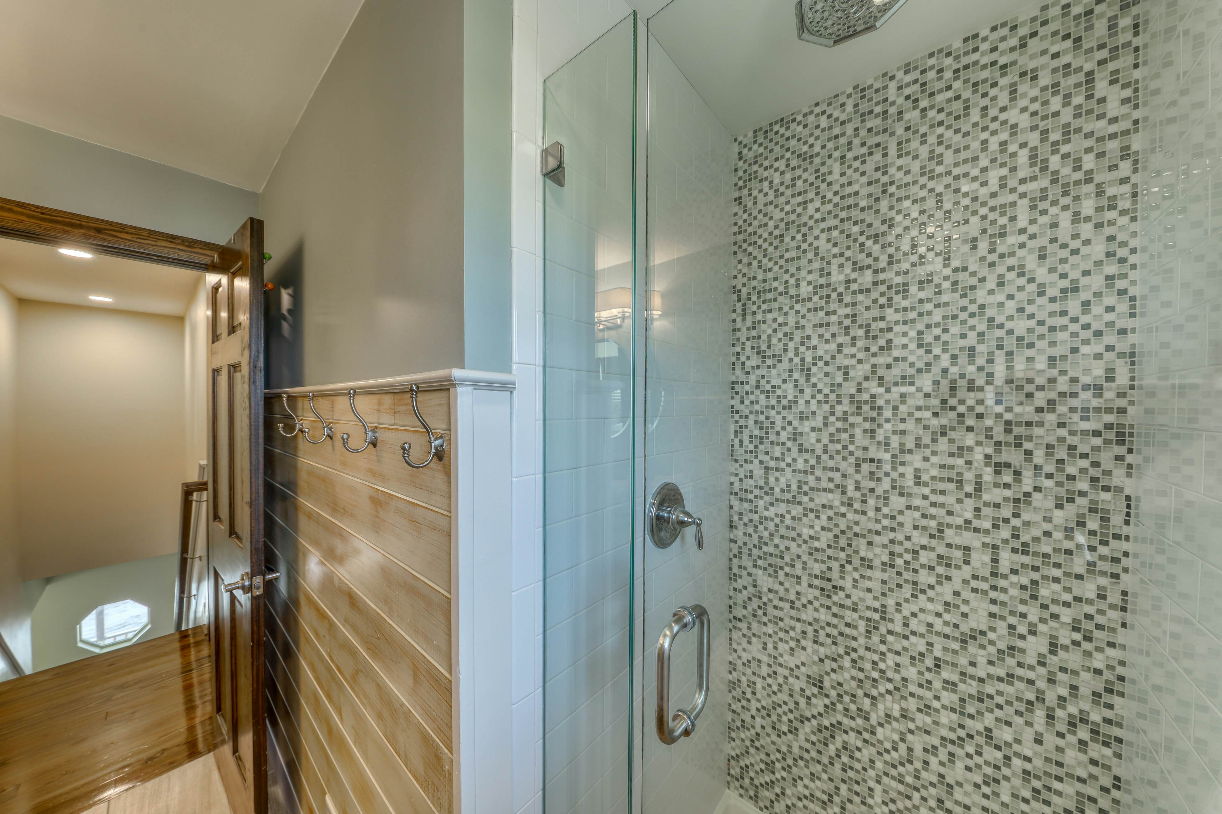 Raised oceanfront home with elevator & outdoor shower just steps from beach