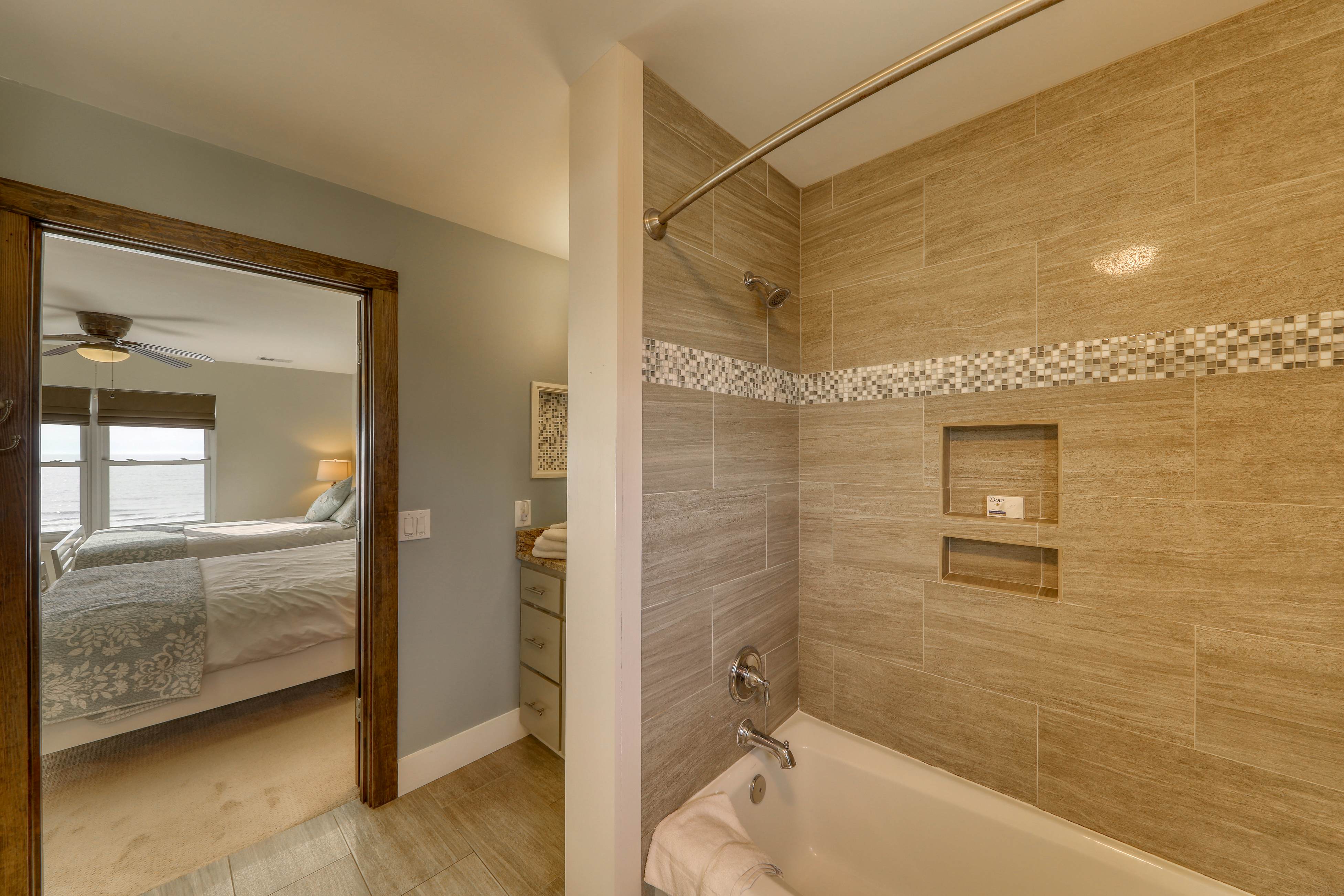 Raised oceanfront home with elevator & outdoor shower just steps from beach