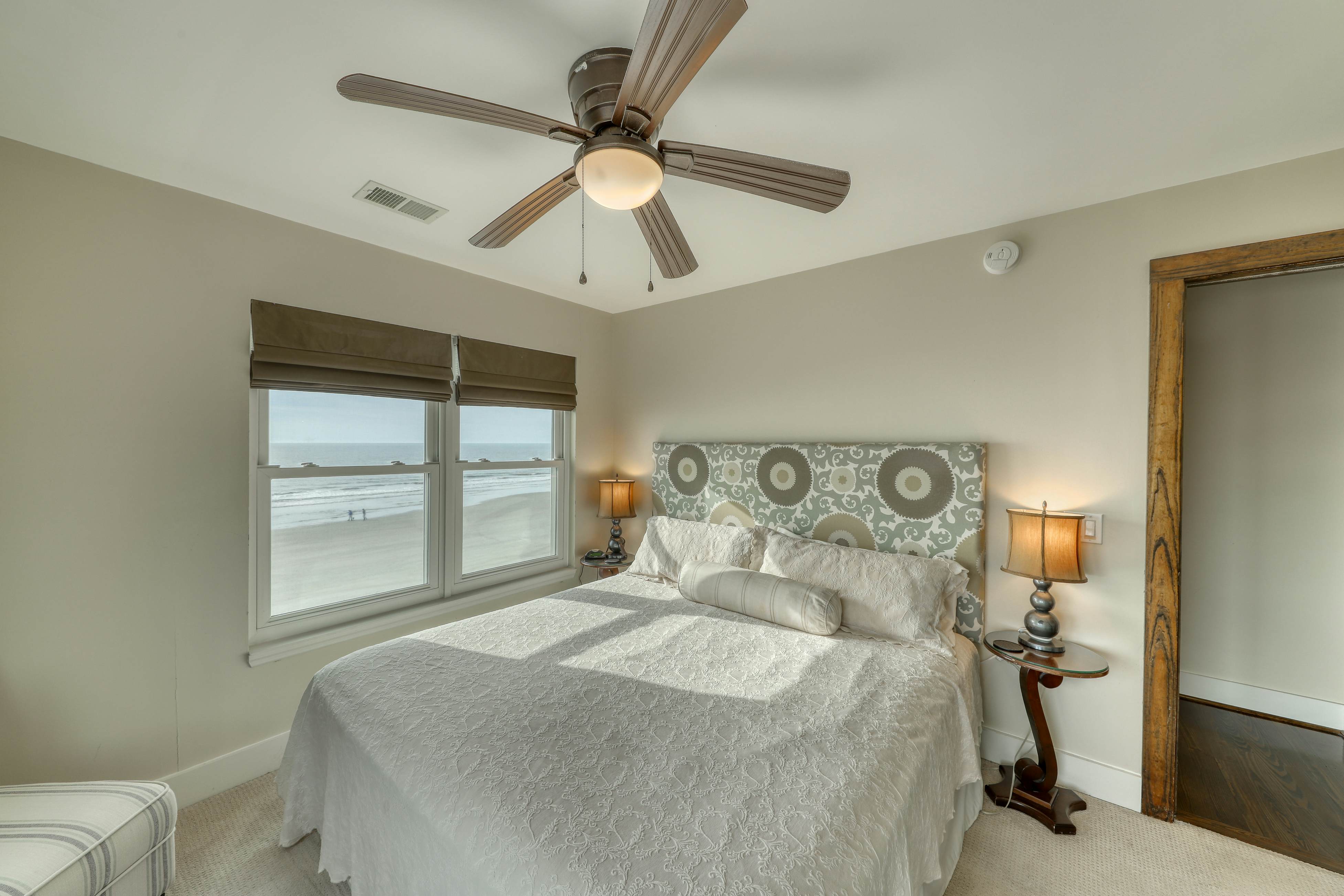 Raised oceanfront home with elevator & outdoor shower just steps from beach