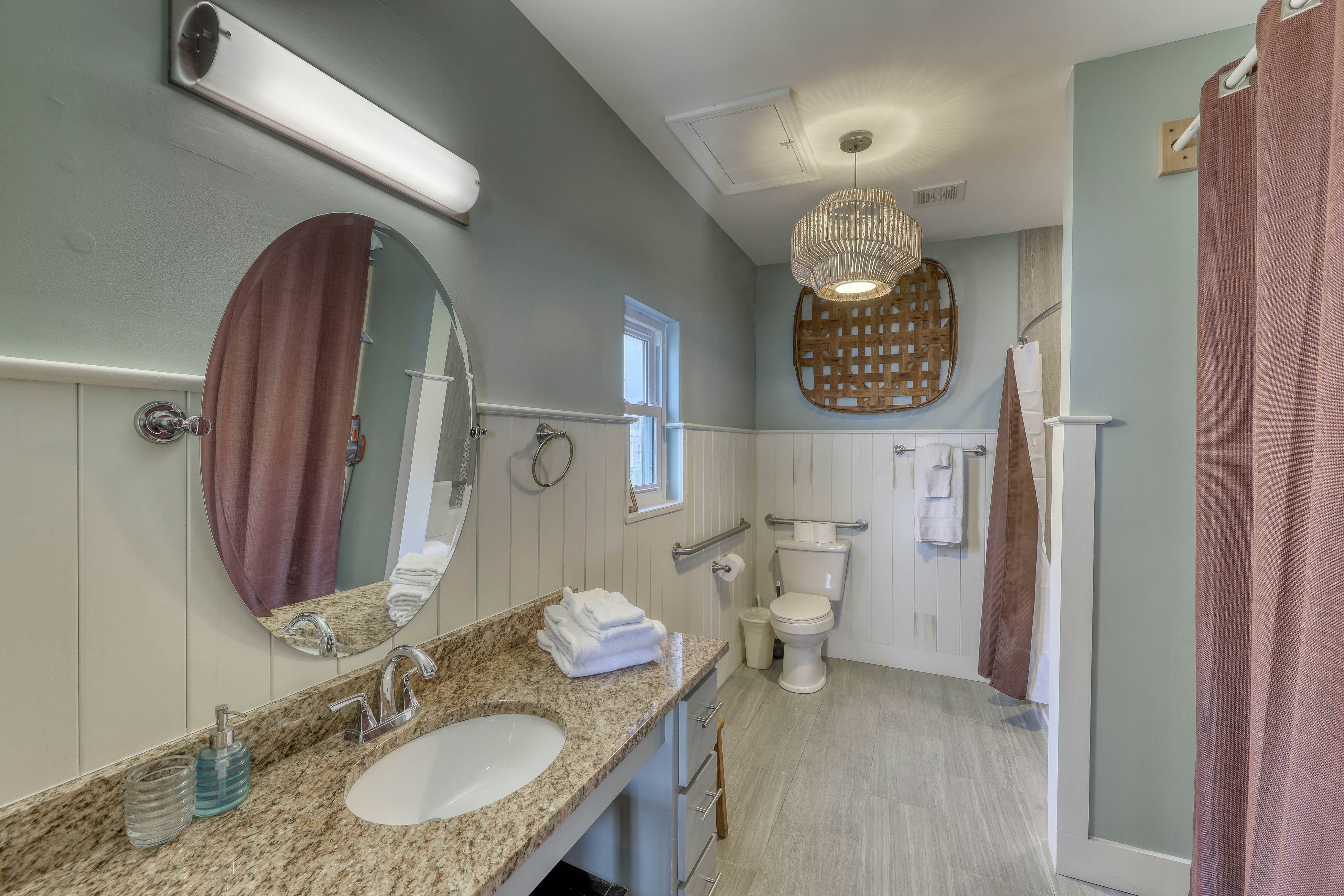 Raised oceanfront home with elevator & outdoor shower just steps from beach