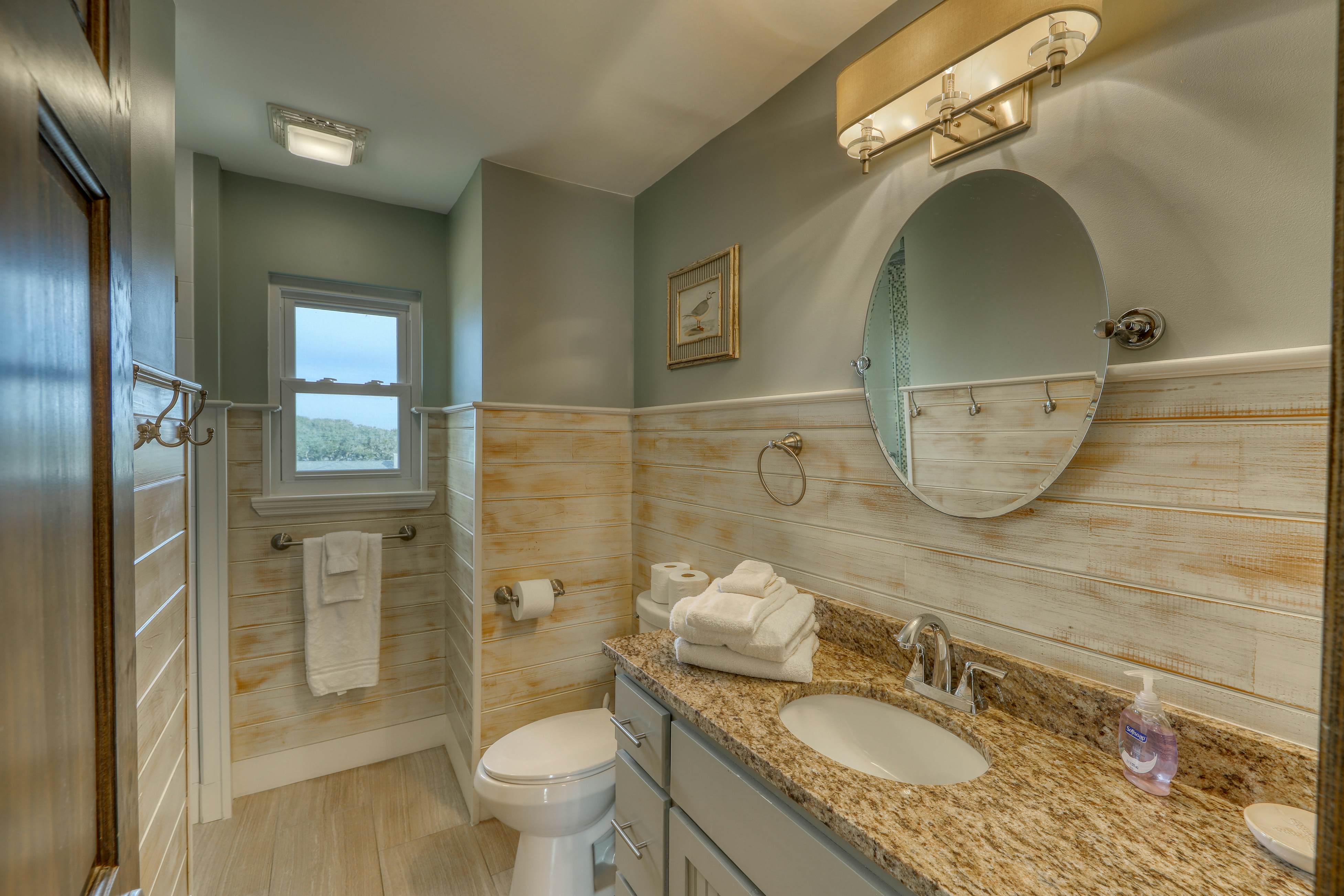 Raised oceanfront home with elevator & outdoor shower just steps from beach