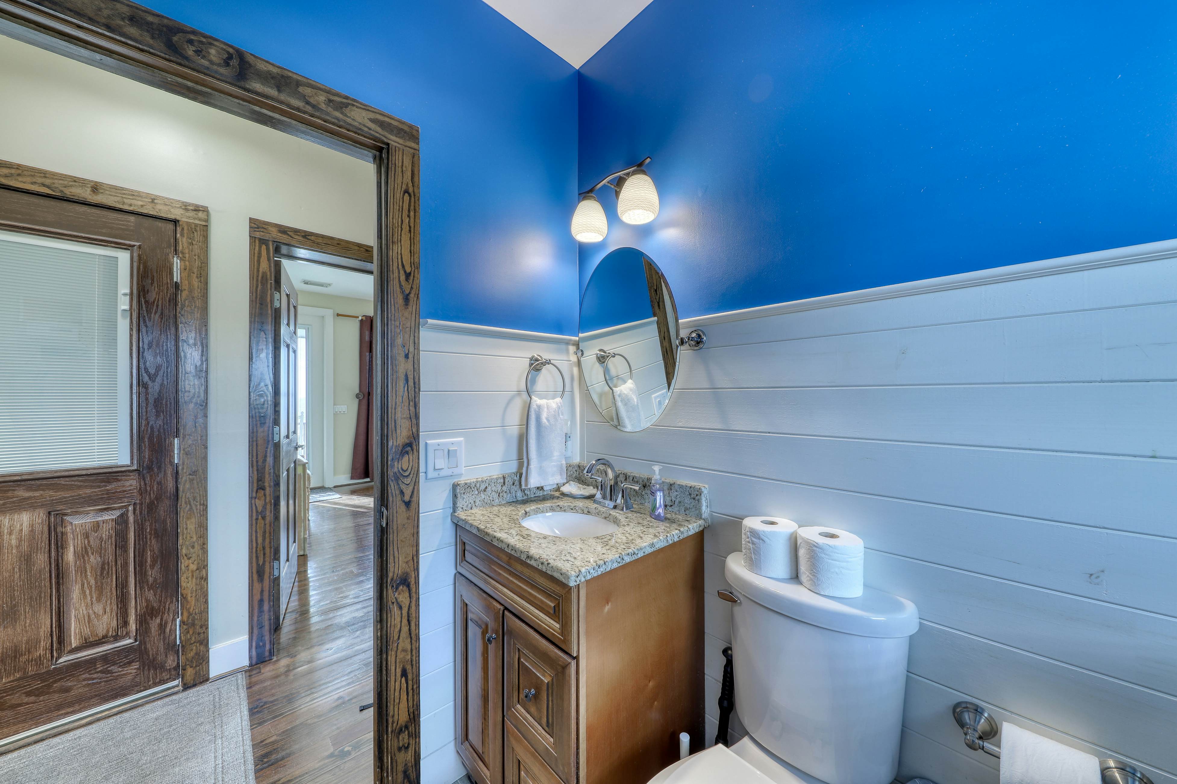 Raised oceanfront home with elevator & outdoor shower just steps from beach