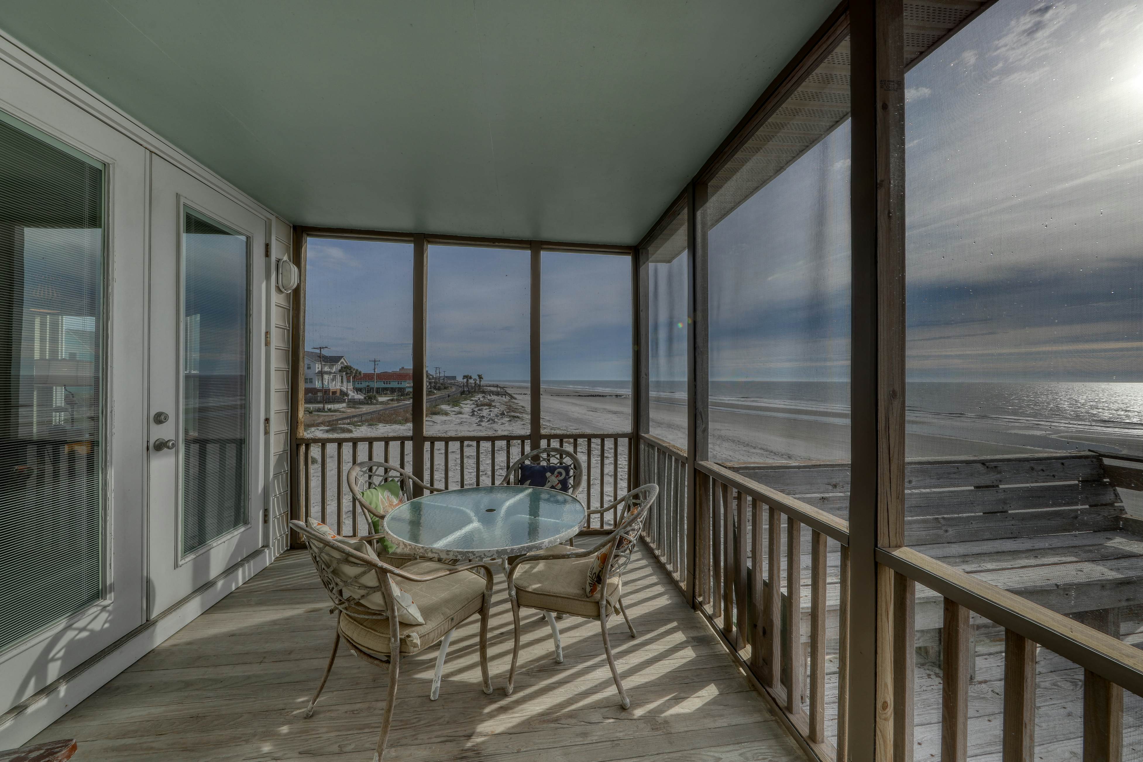 Raised oceanfront home with elevator & outdoor shower just steps from beach