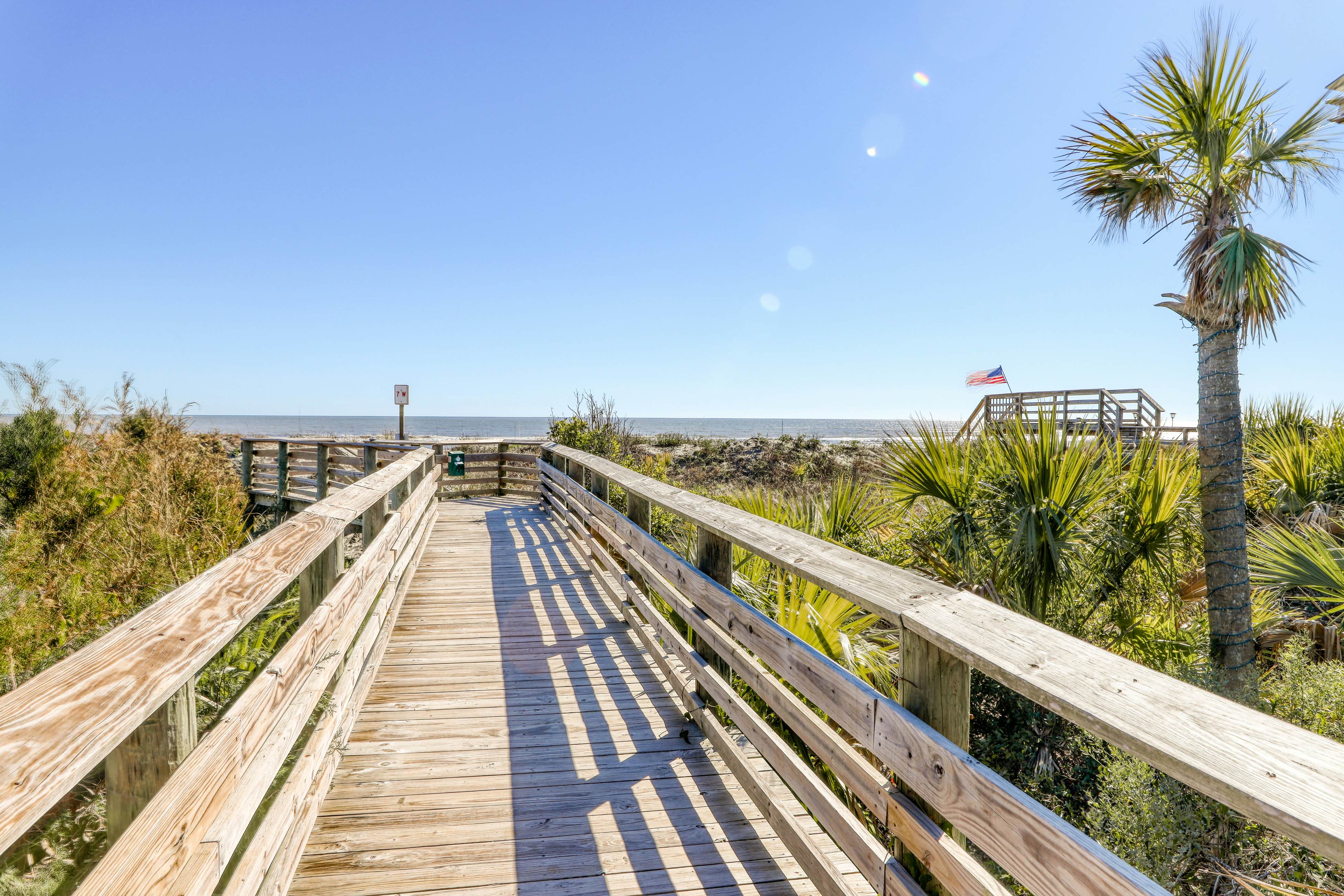 Raised oceanfront home with elevator & outdoor shower just steps from beach