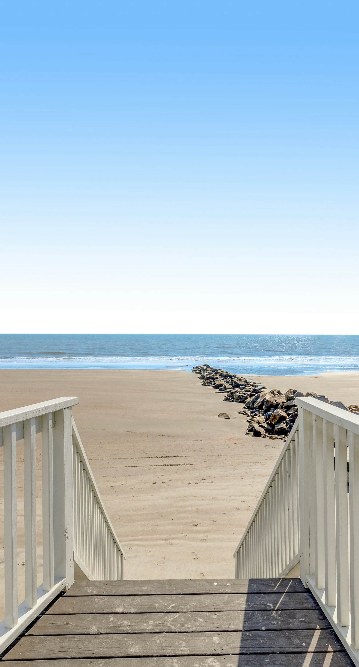 Newly renovated oceanfront home with private beach access & screened porch