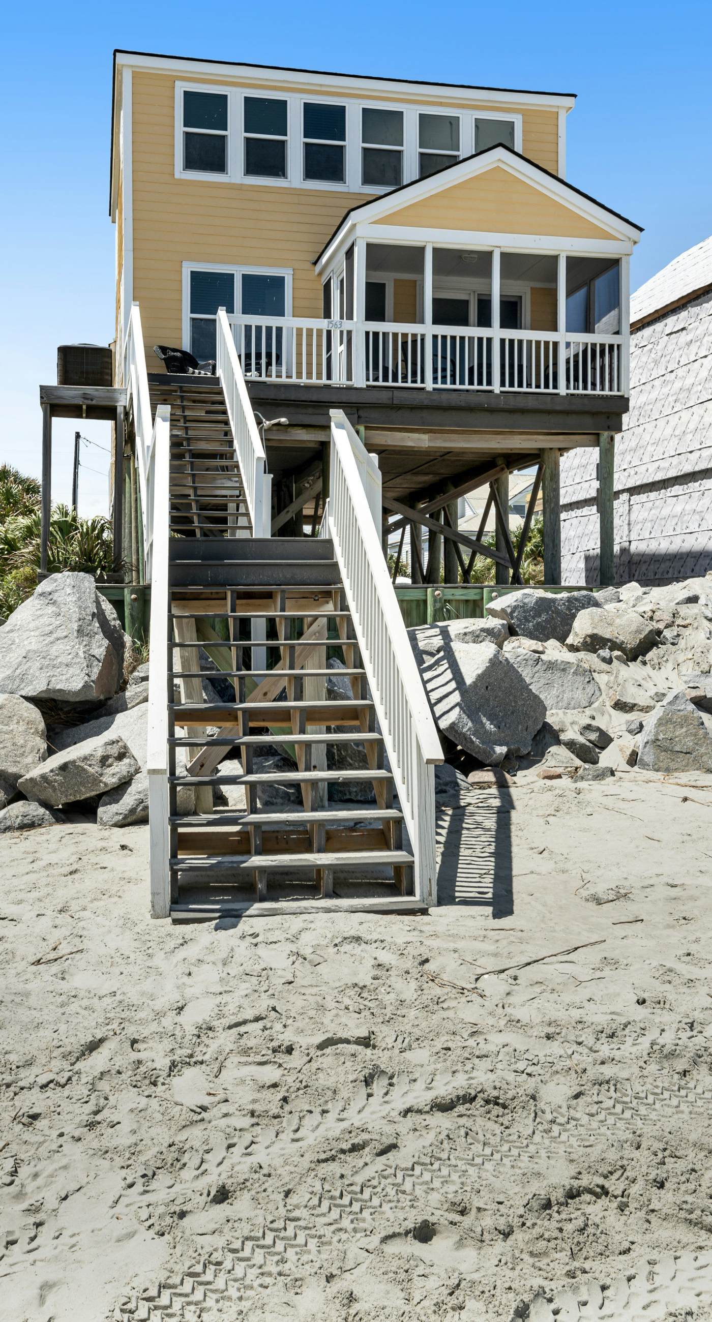 Newly renovated oceanfront home with private beach access & screened porch