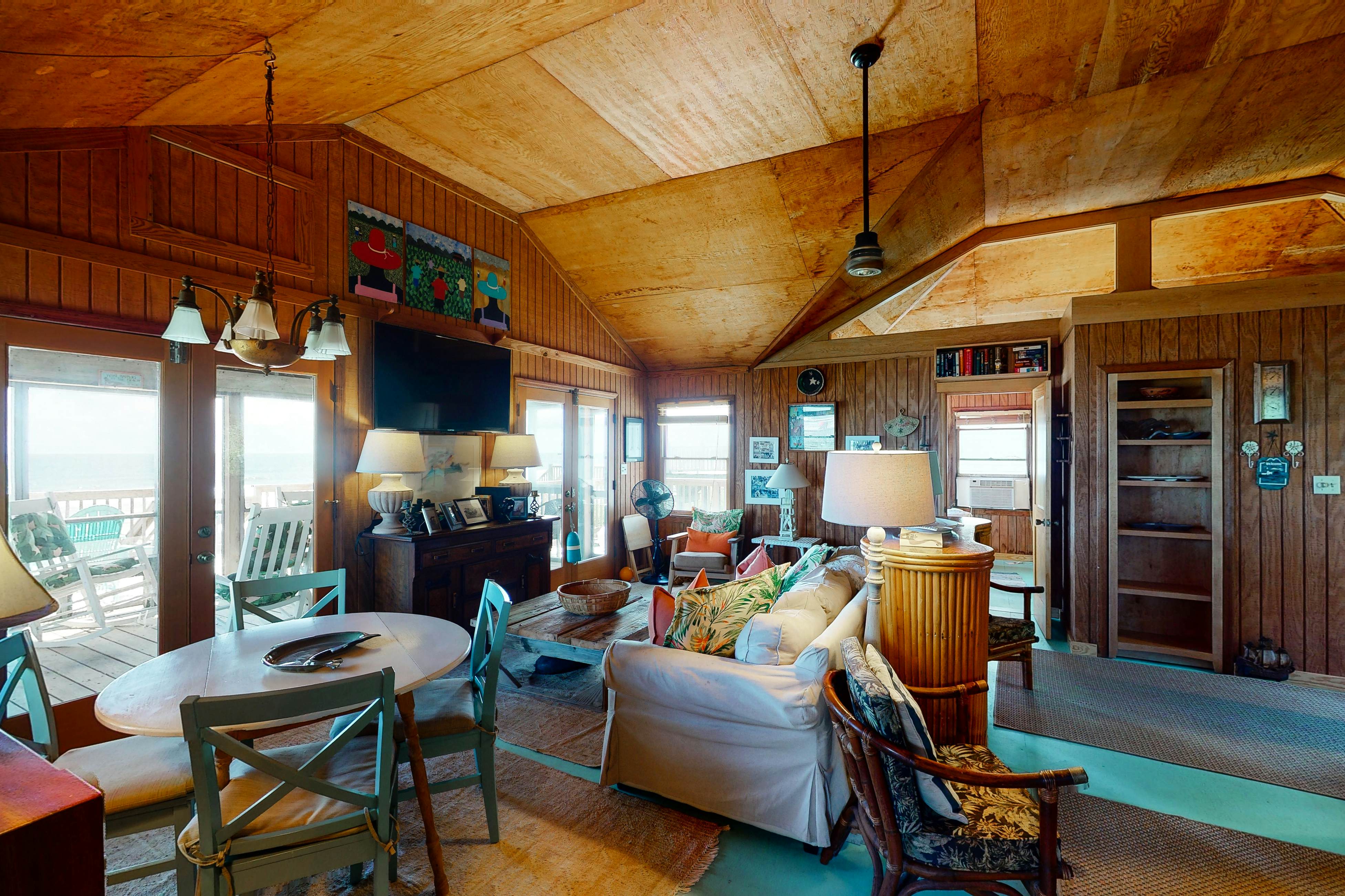 Rustic oceanfront home with screened porch, free WiFi, deck, & beach access