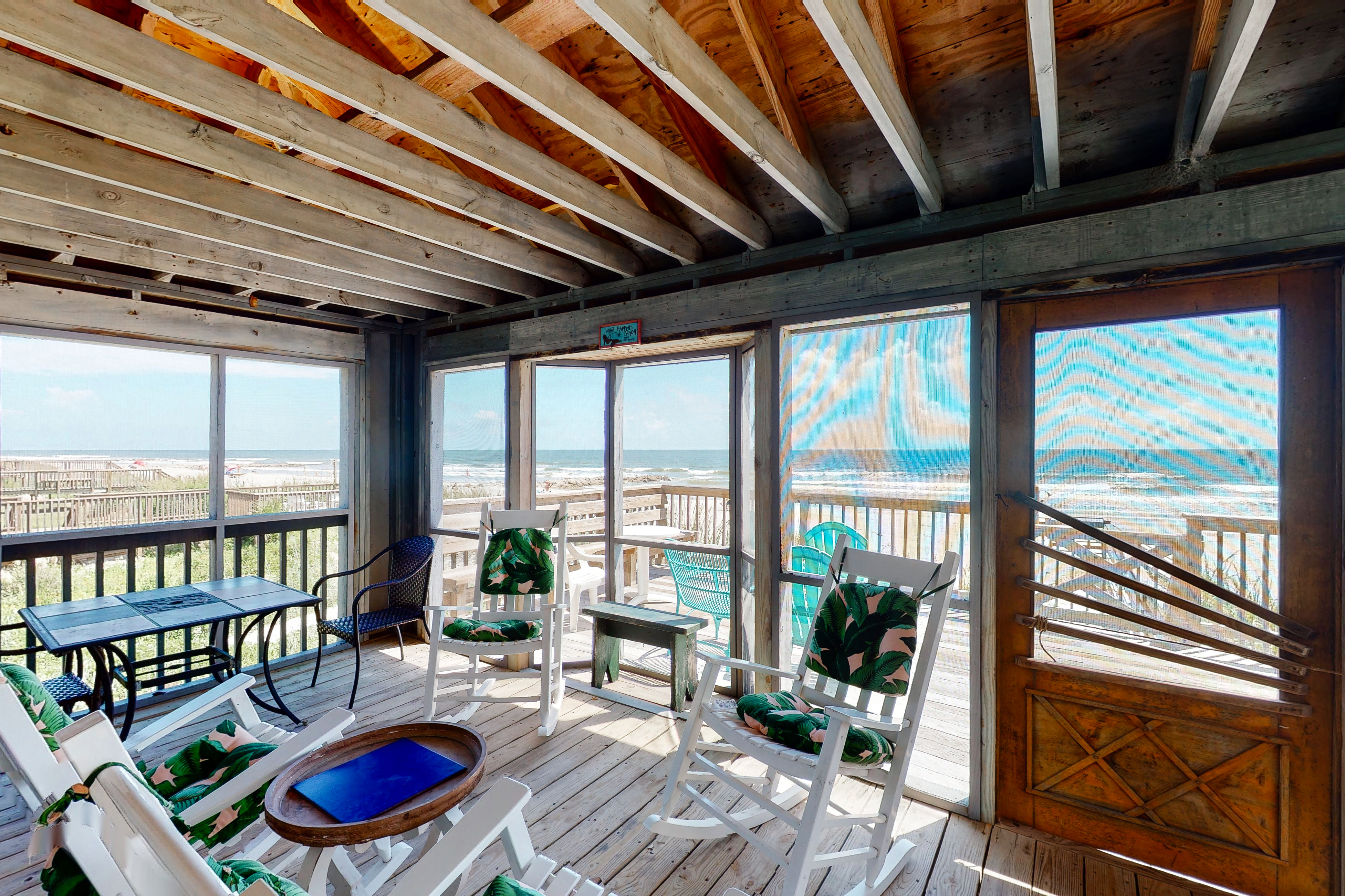 Rustic oceanfront home with screened porch, free WiFi, deck, & beach access