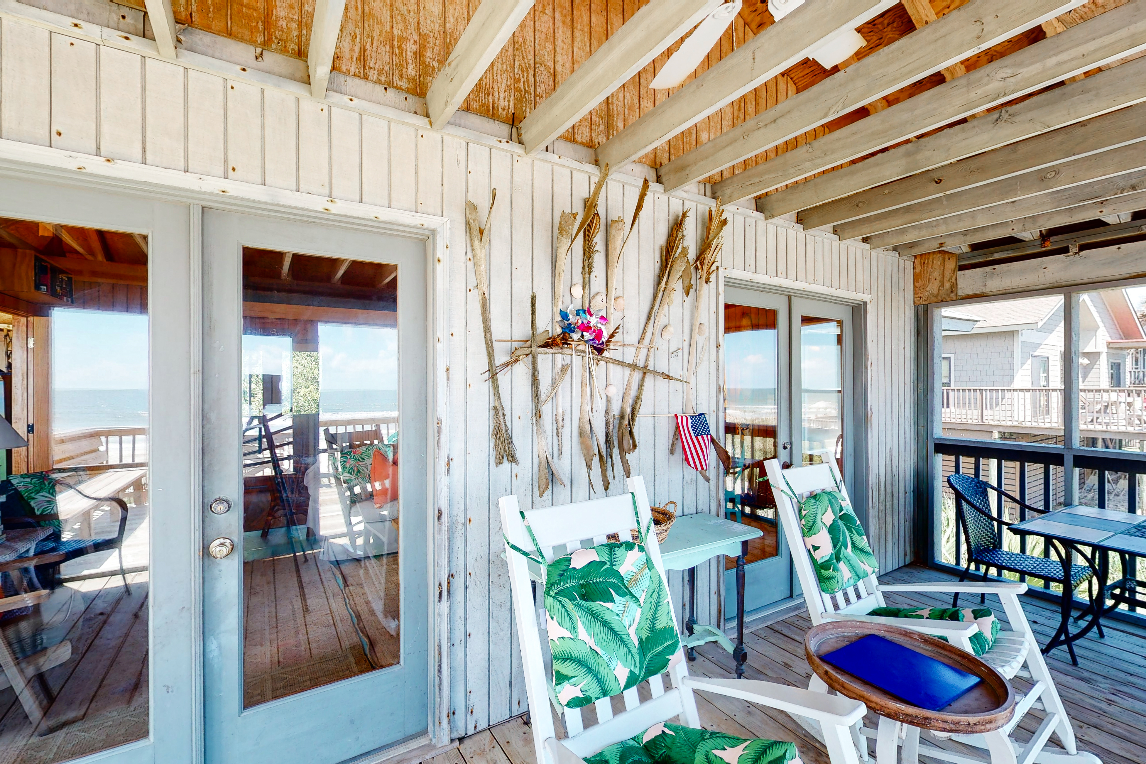 Rustic oceanfront home with screened porch, free WiFi, deck, & beach access