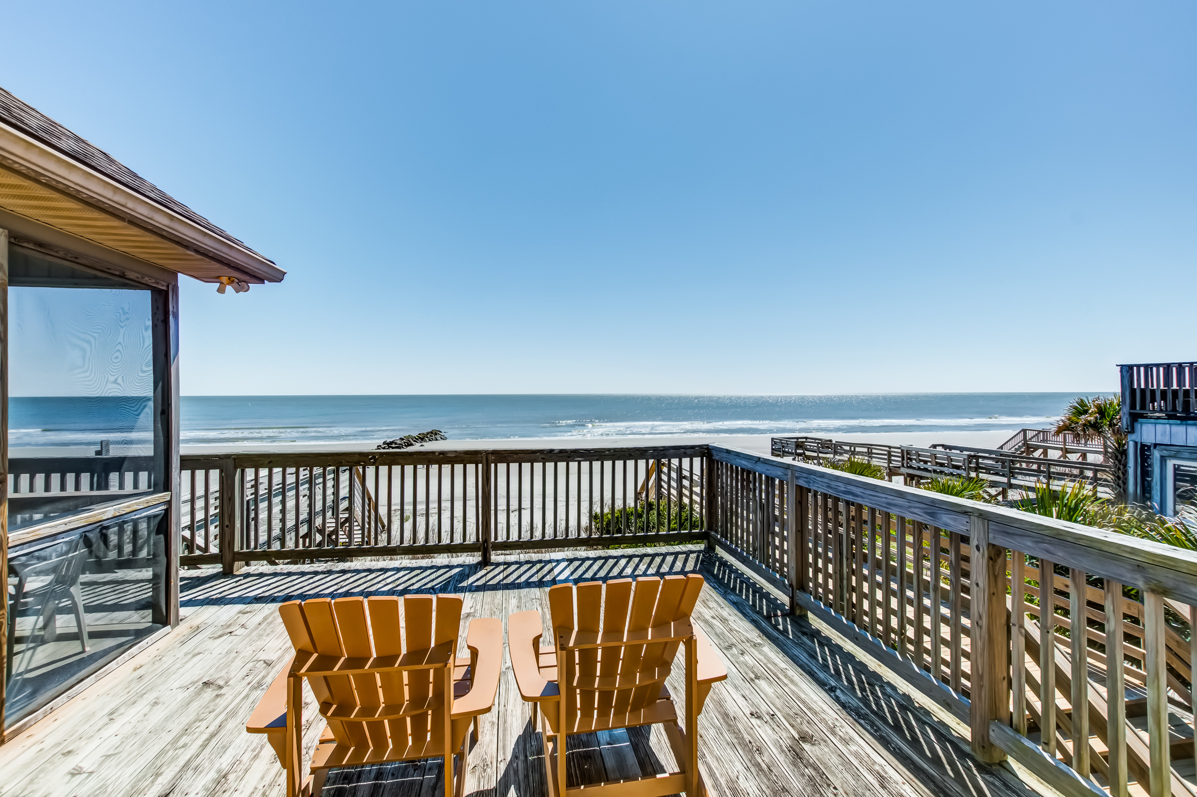 Oceanfront home with private beach access, screened porch & large deck