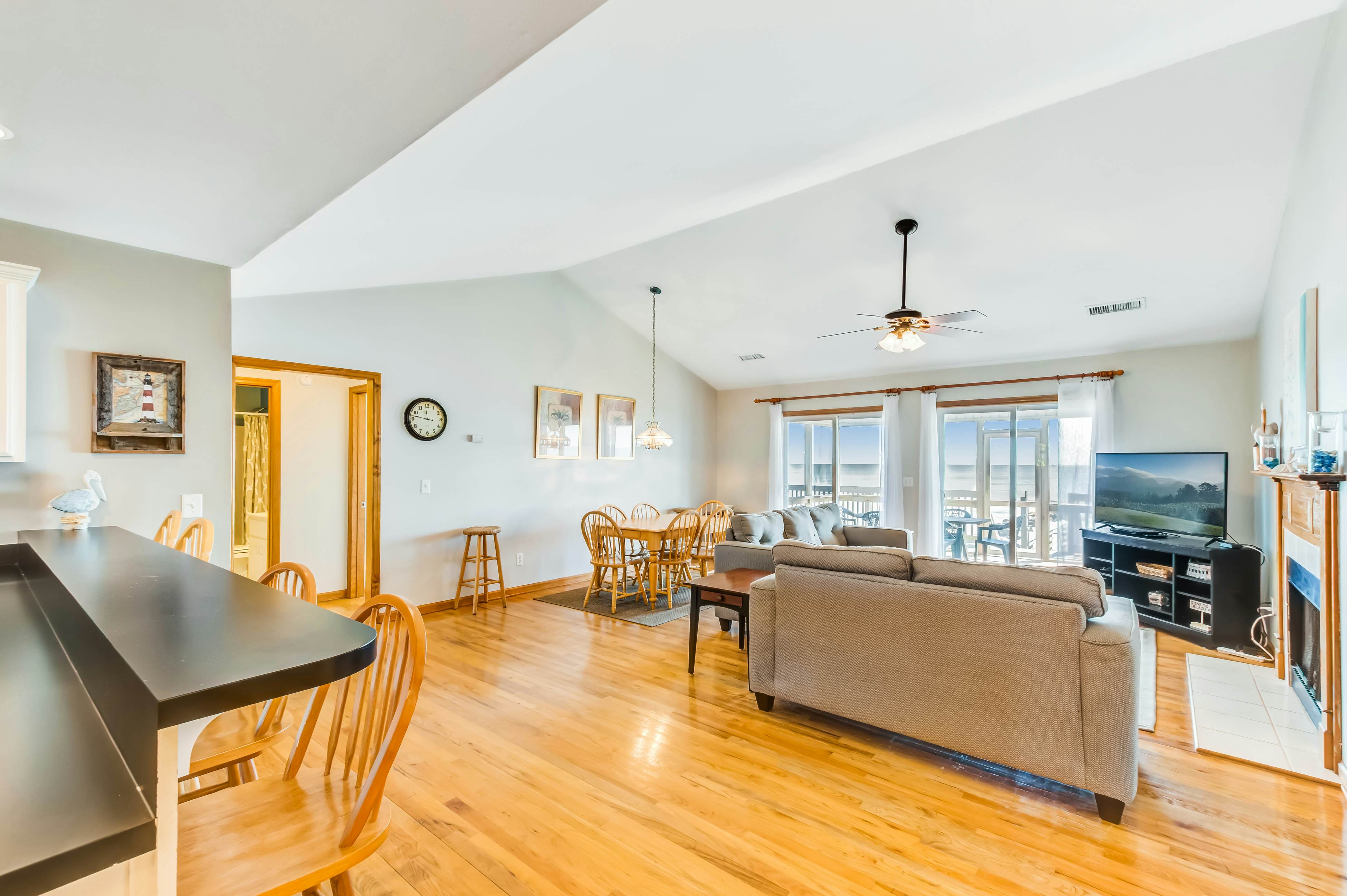 Oceanfront home with private beach access, screened porch & large deck