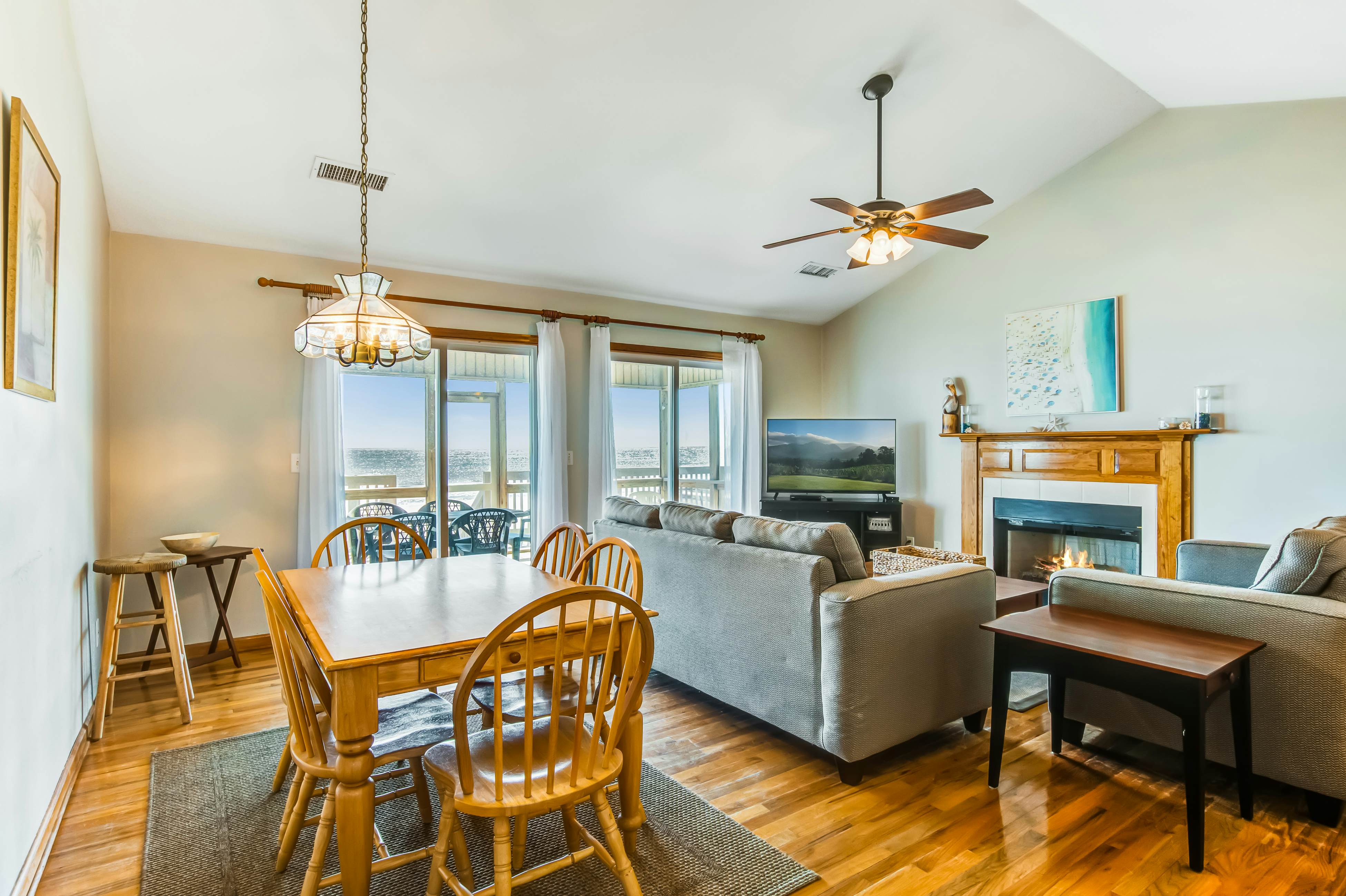 Oceanfront home with private beach access, screened porch & large deck