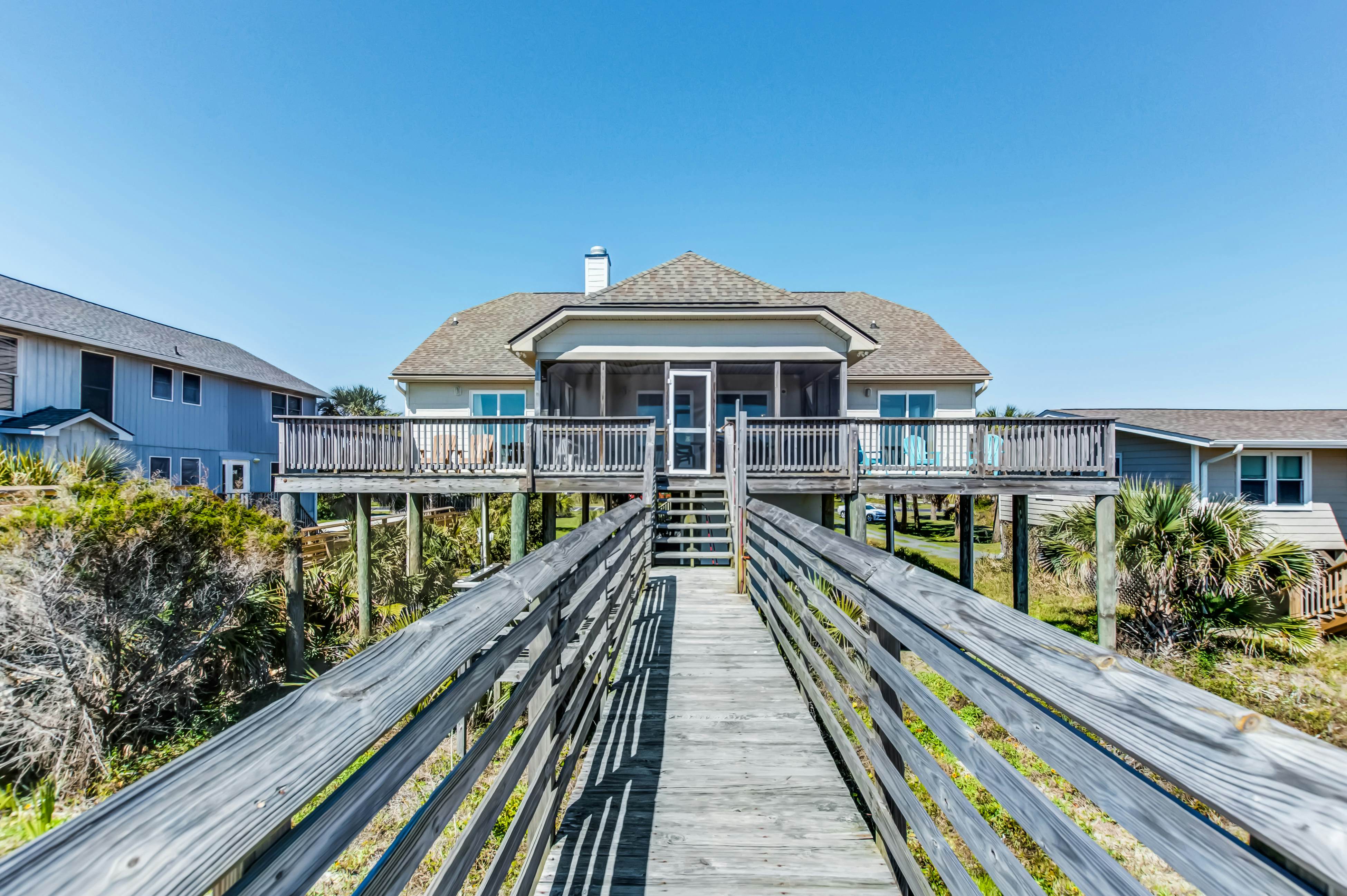 Oceanfront home with private beach access, screened porch & large deck