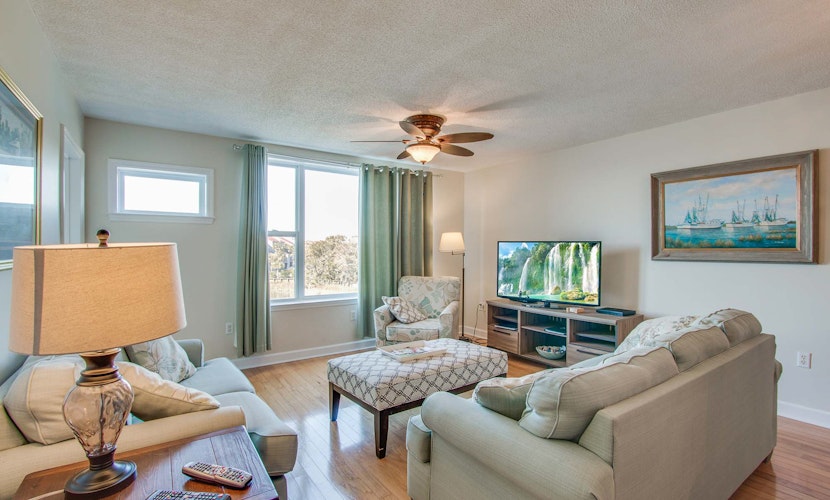 Second-floor condo with river views and access to a community pool