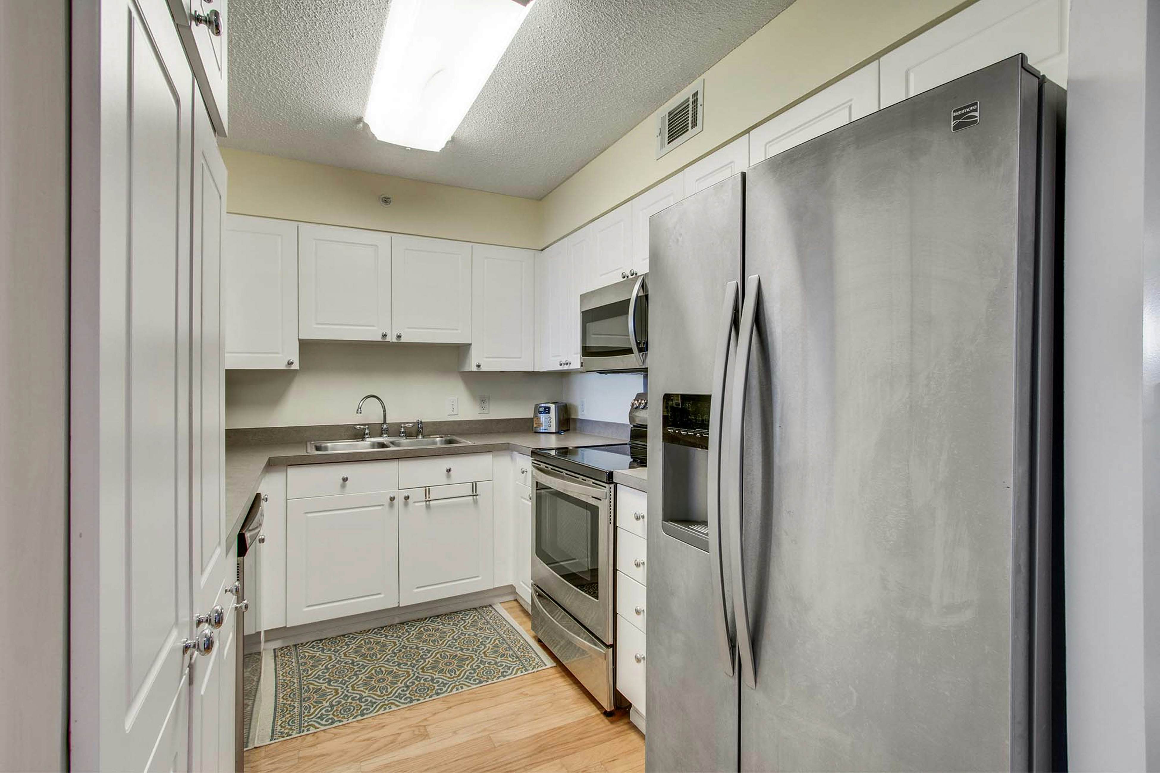 Second-floor condo with river views and access to a community pool