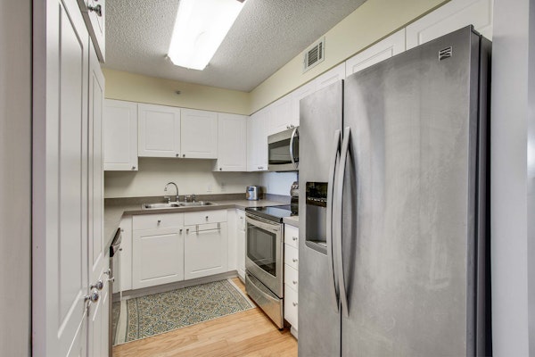 Second-floor condo with river views and access to a community pool