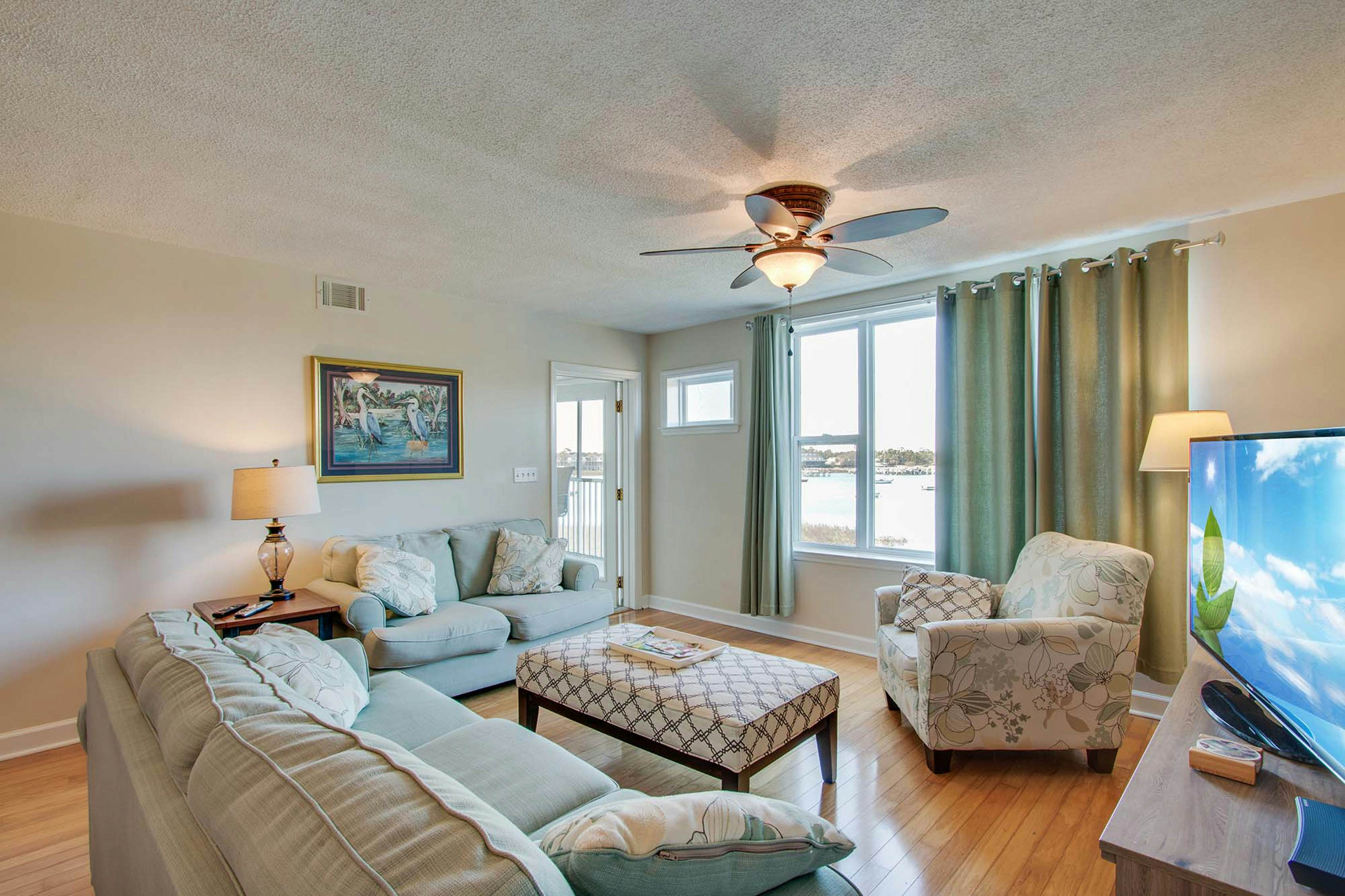 Second-floor condo with river views and access to a community pool