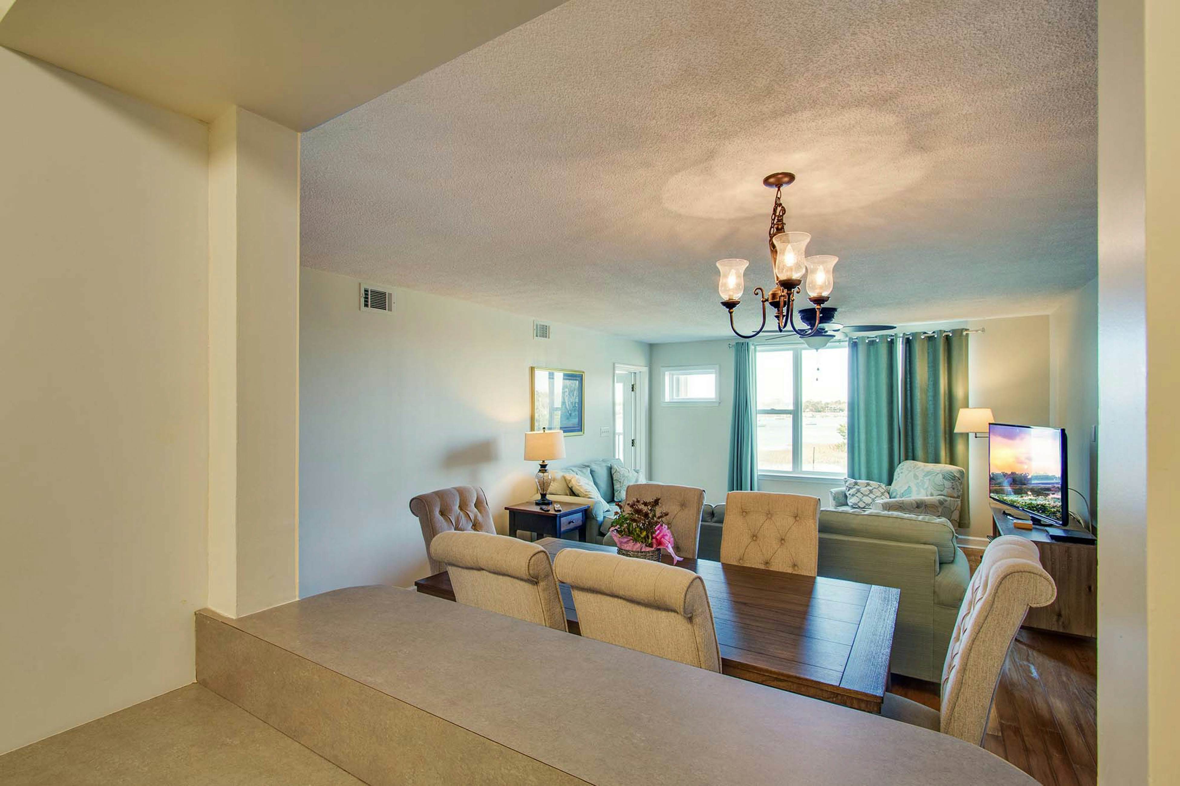 Second-floor condo with river views and access to a community pool