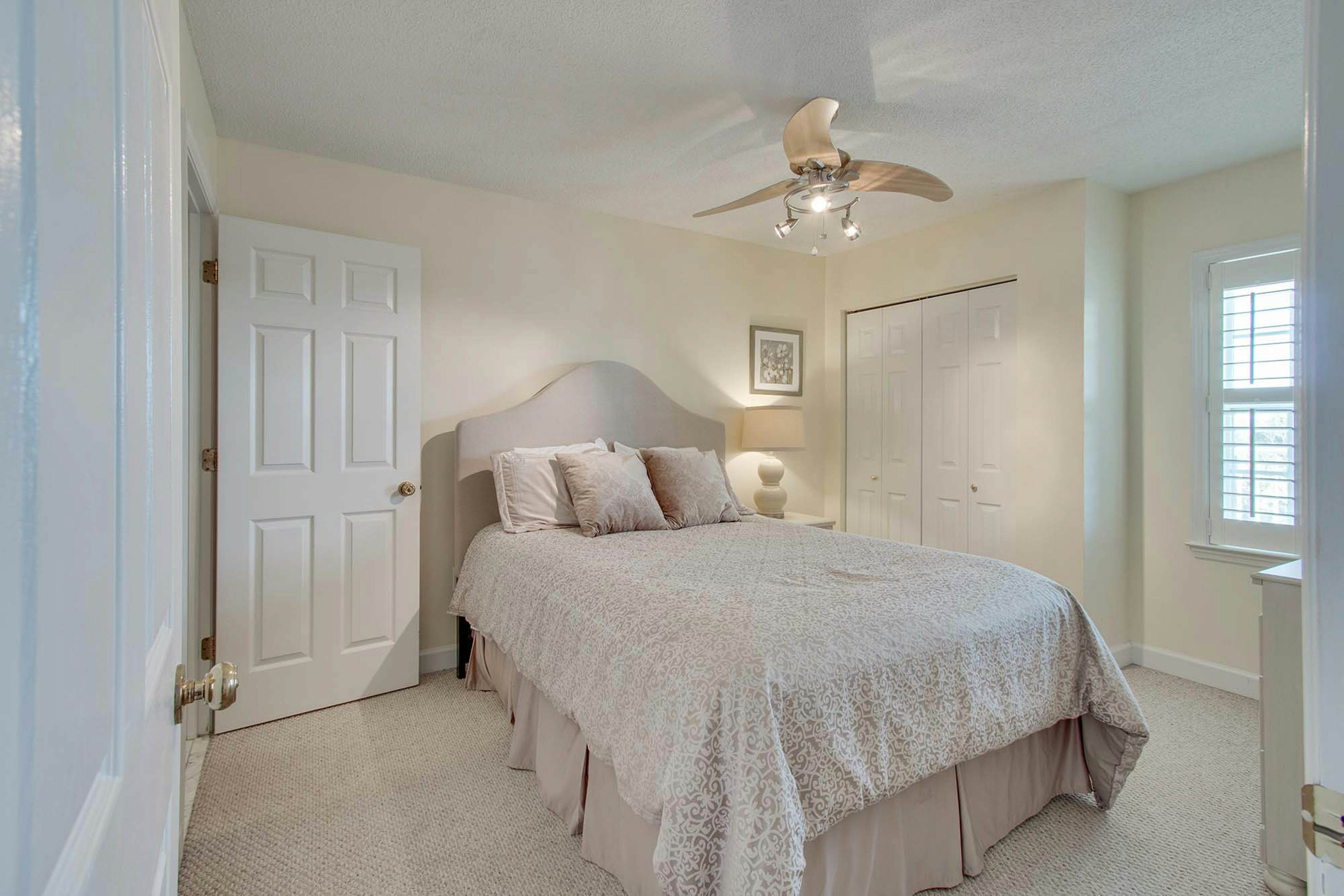 Second-floor condo with river views and access to a community pool