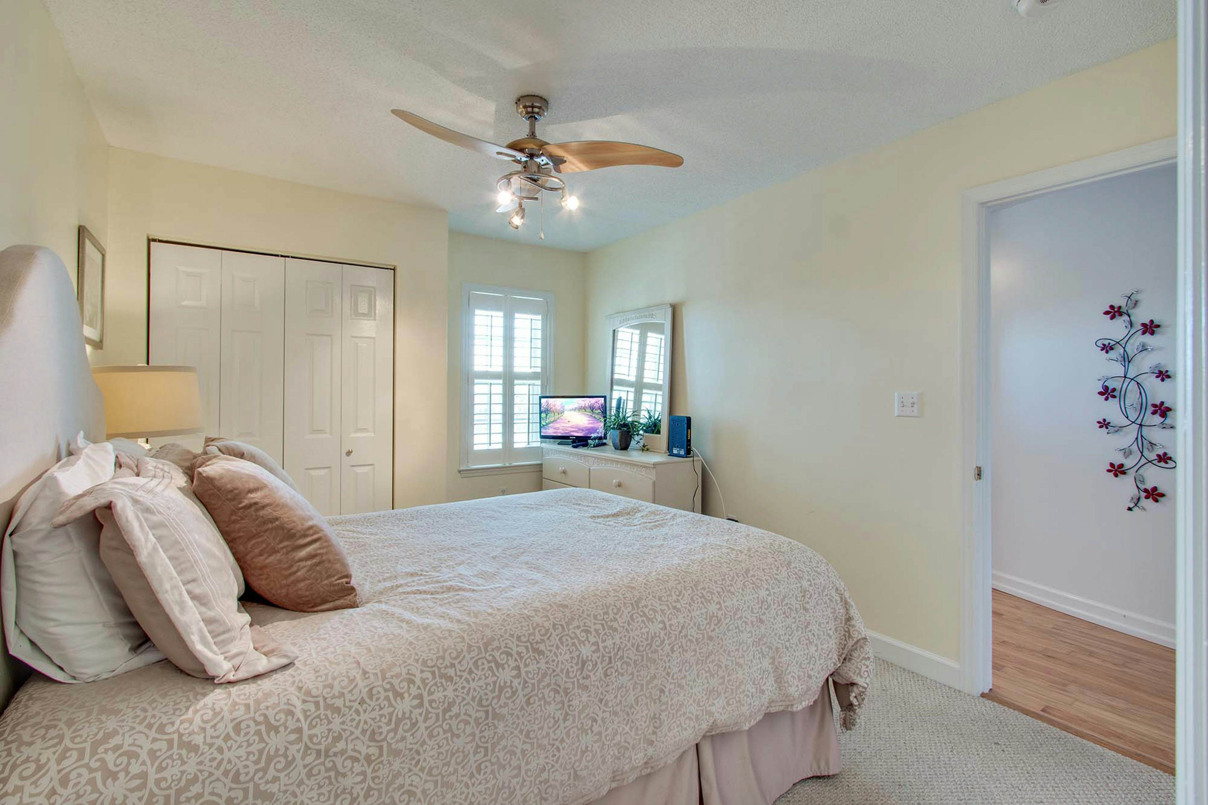 Second-floor condo with river views and access to a community pool