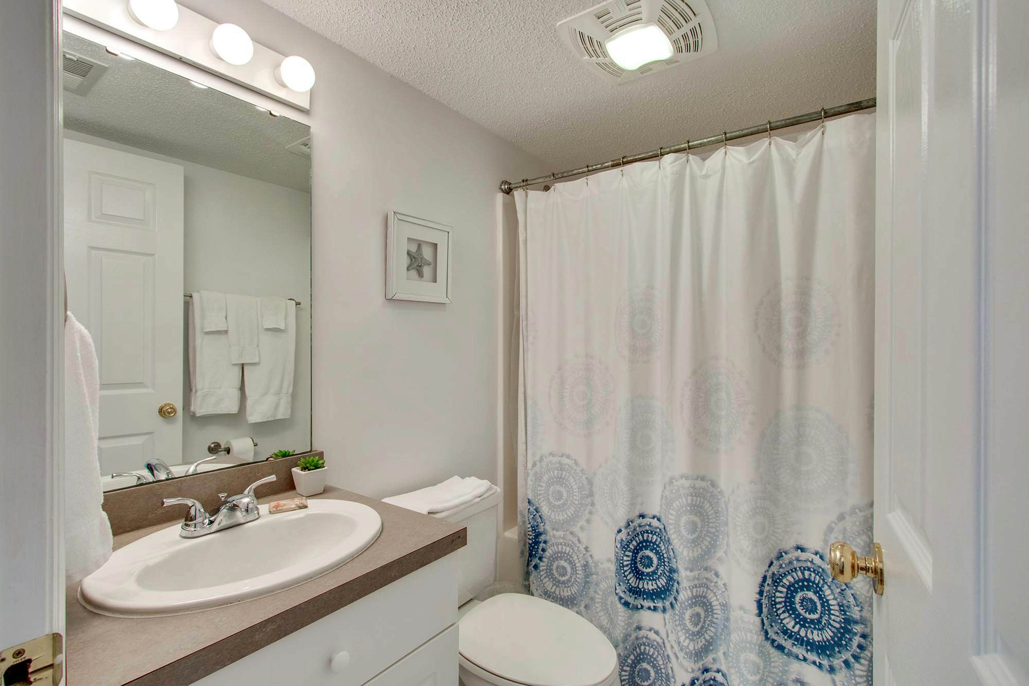 Second-floor condo with river views and access to a community pool