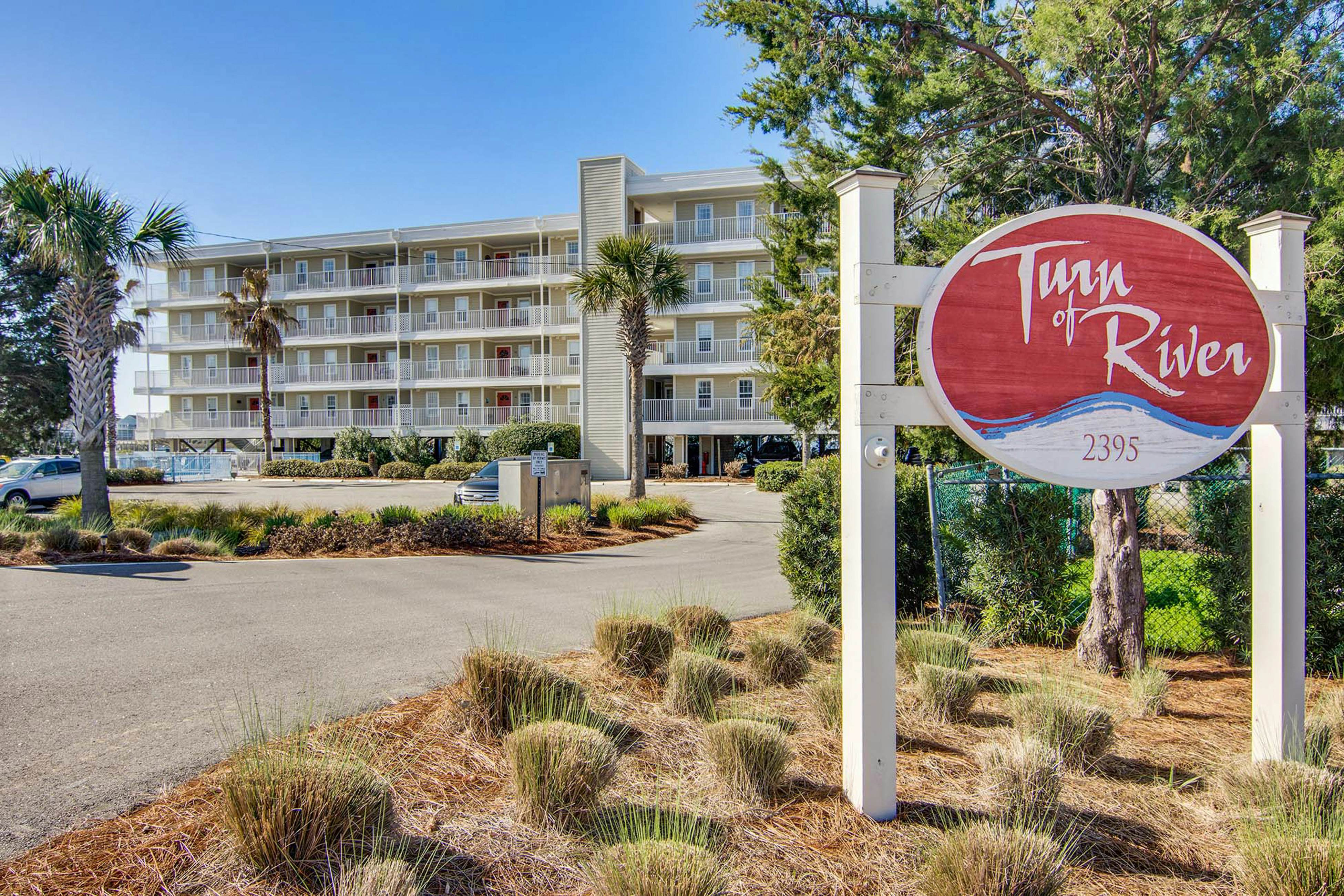 Second-floor condo with river views and access to a community pool