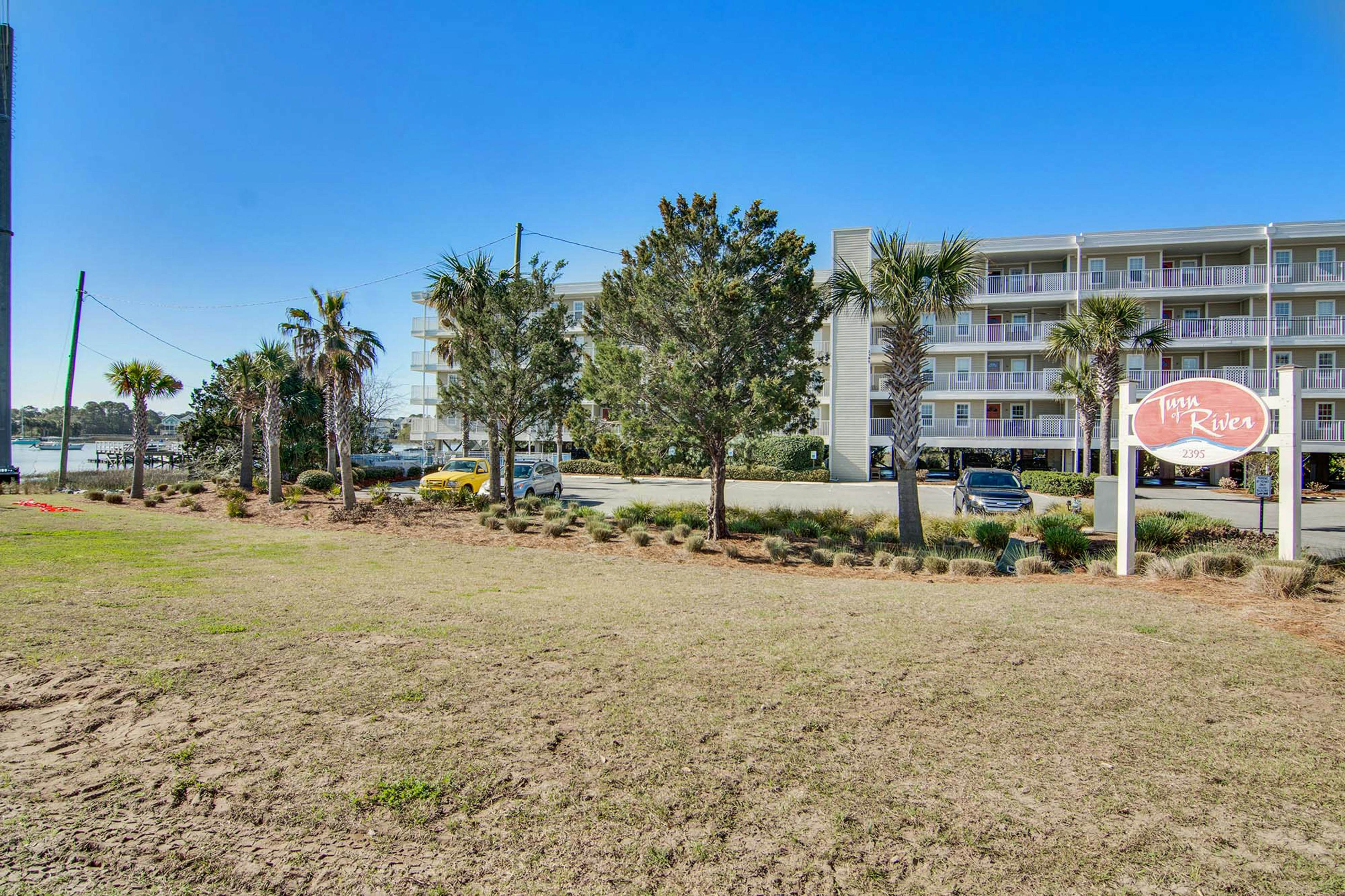 Second-floor condo with river views and access to a community pool