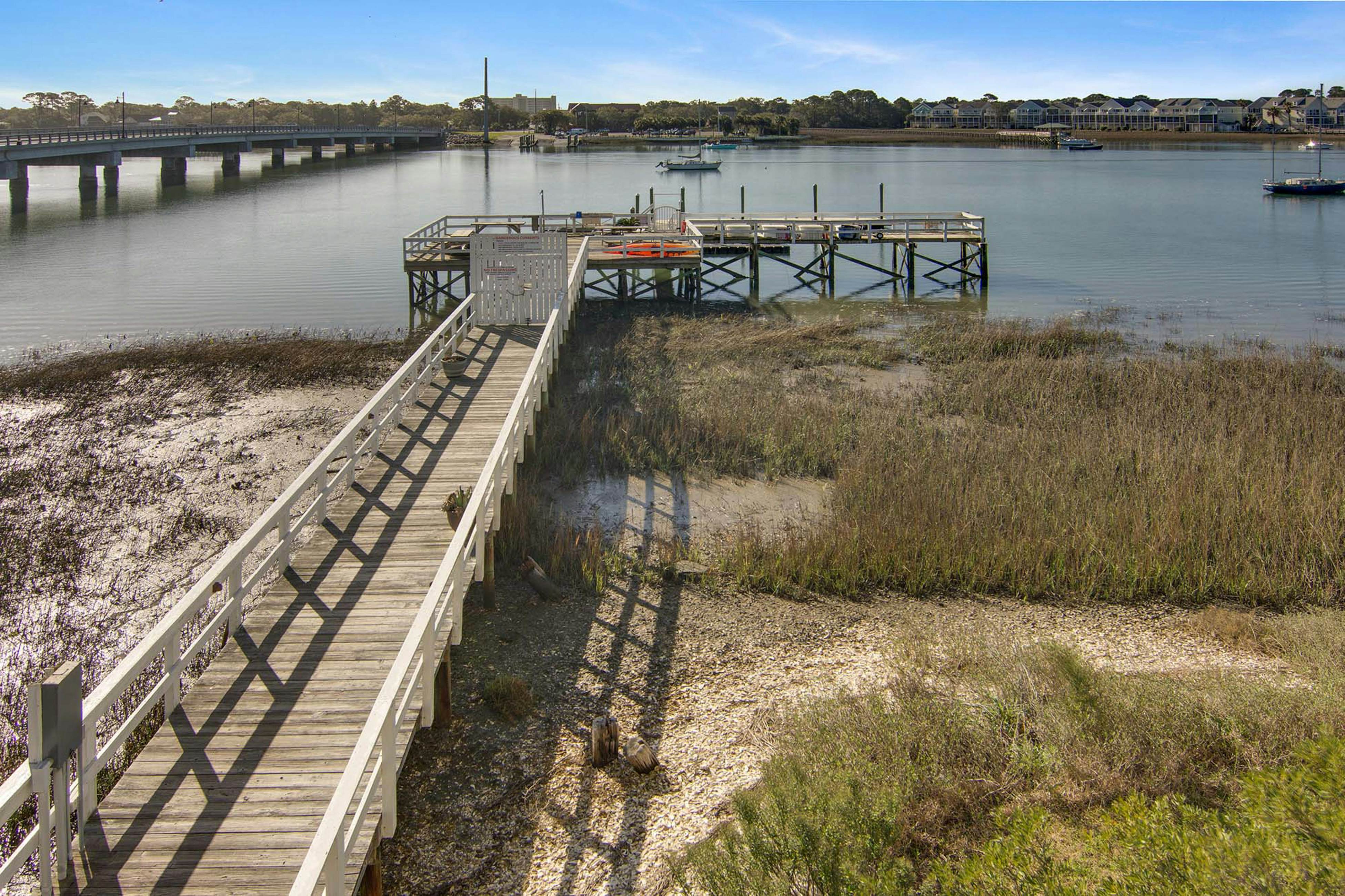 Second-floor condo with river views and access to a community pool