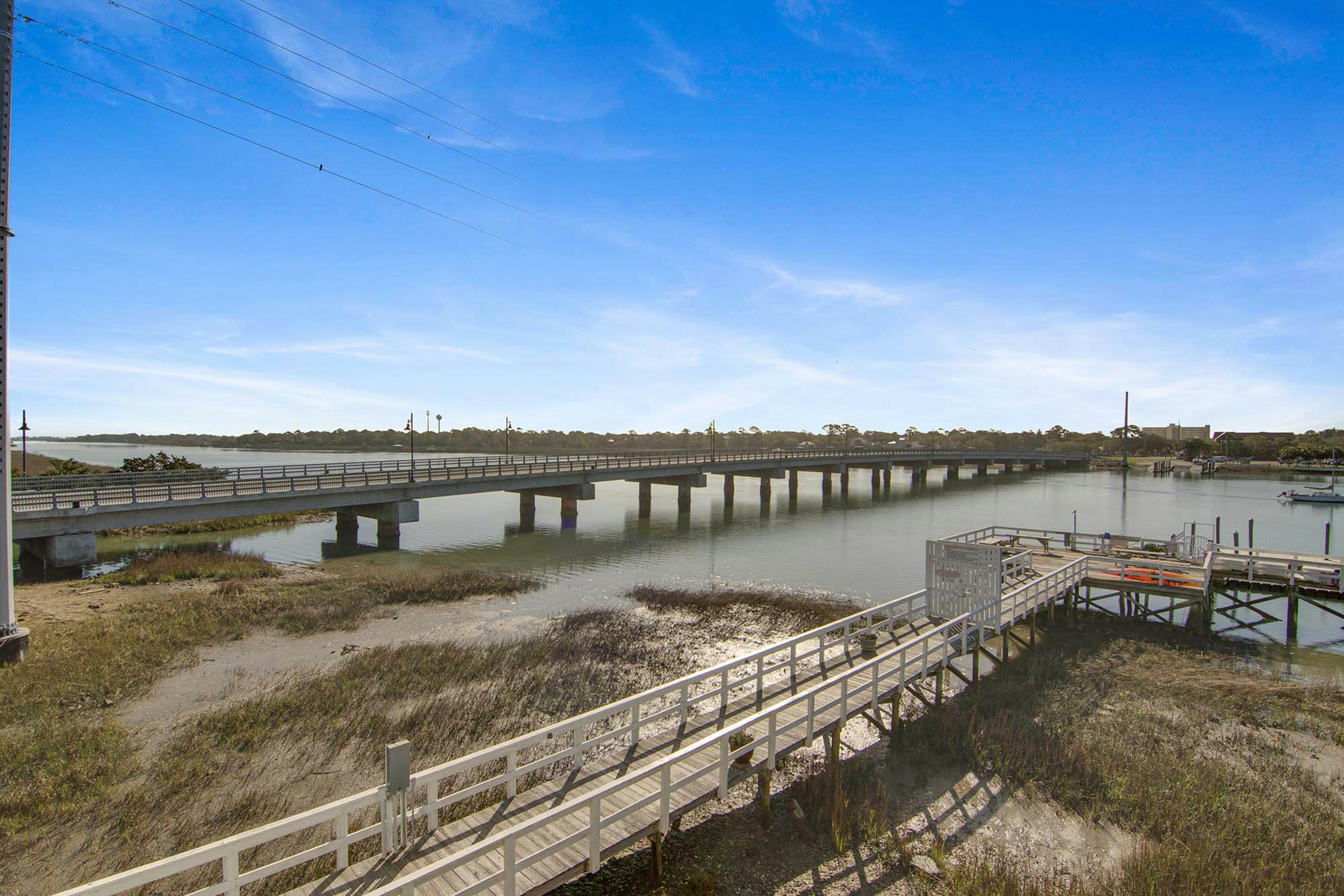 Second-floor condo with river views and access to a community pool