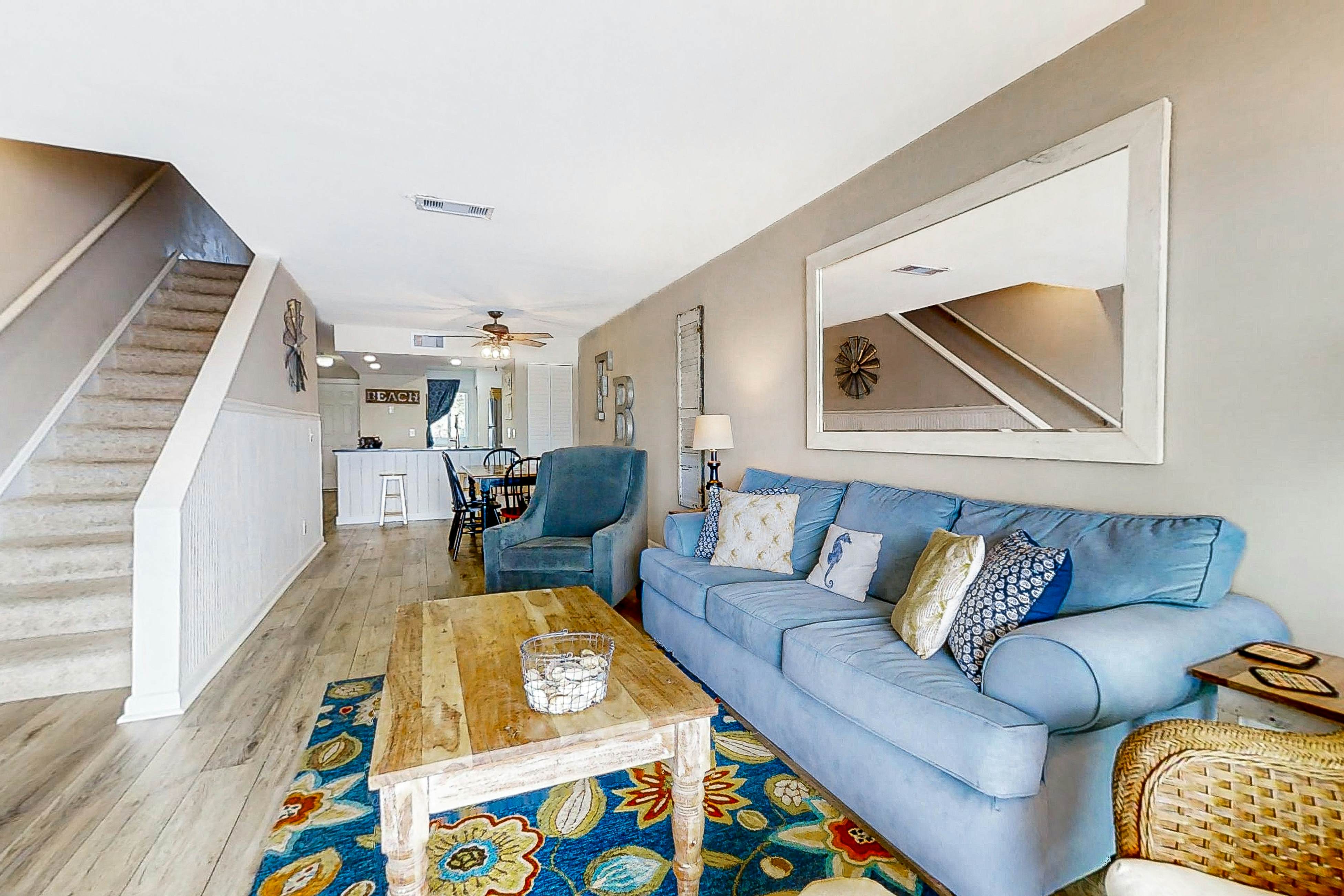 Newly renovated two-story waterfront condo with screened porch, pool, & tennis