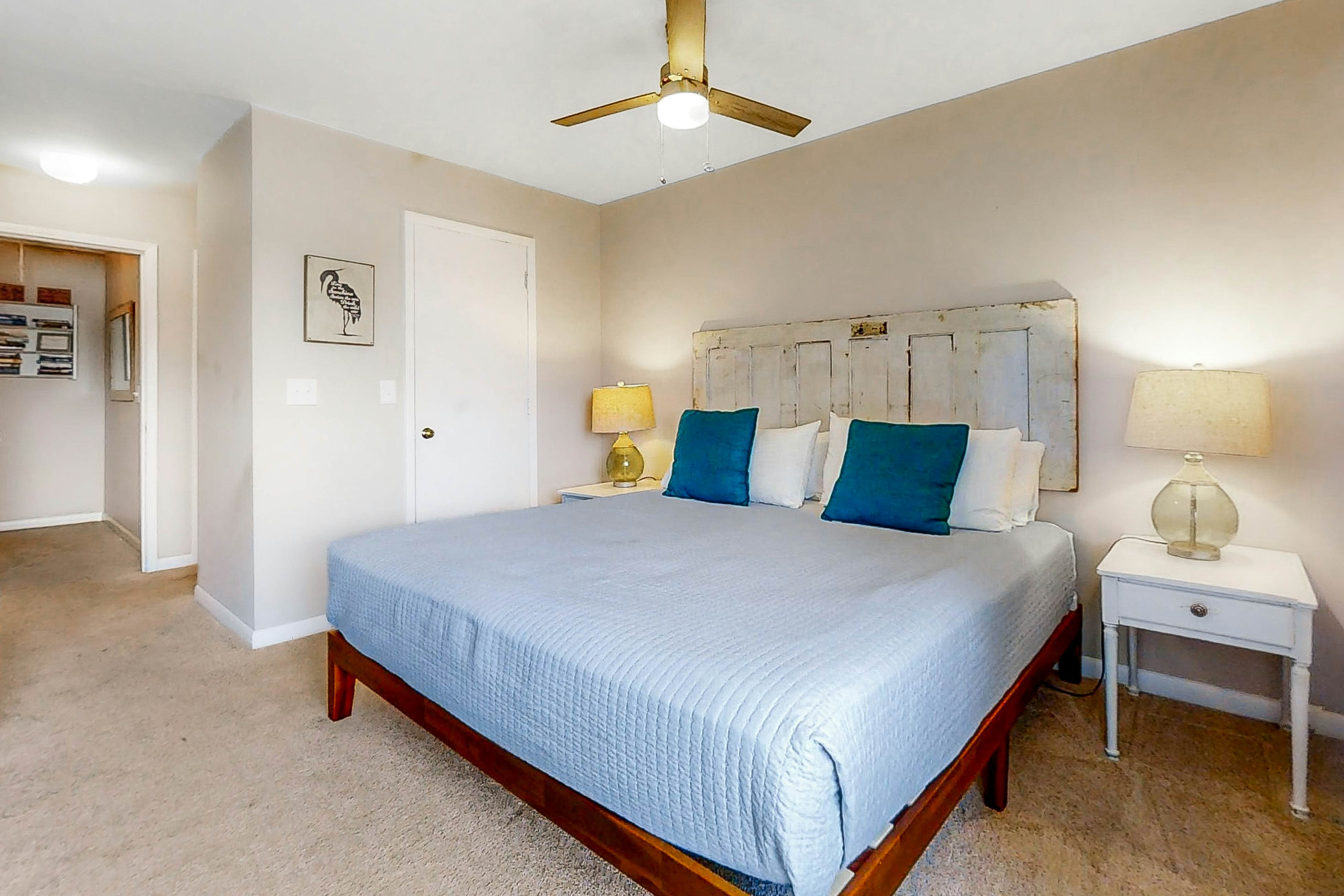 Newly renovated two-story waterfront condo with screened porch, pool, & tennis