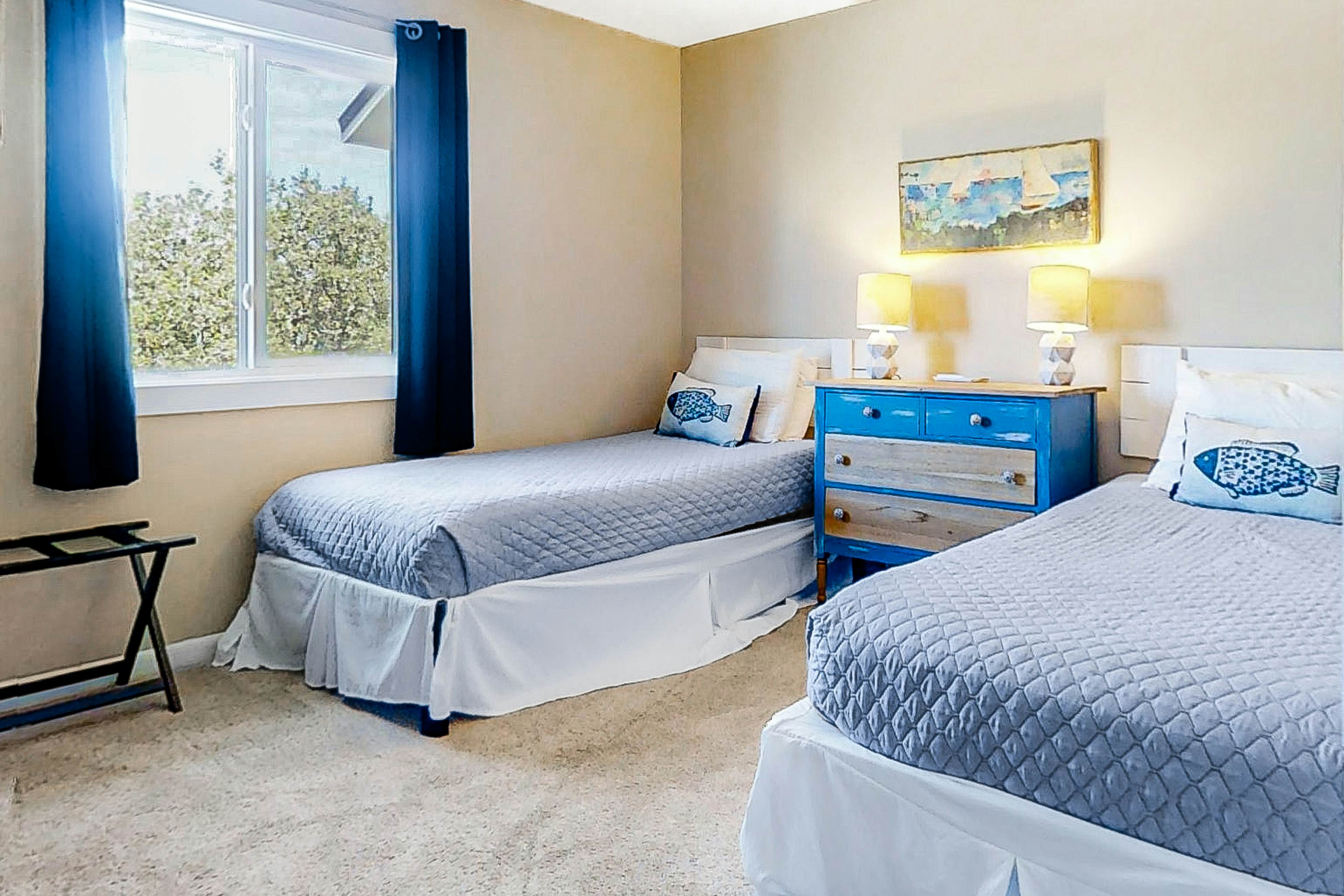 Newly renovated two-story waterfront condo with screened porch, pool, & tennis