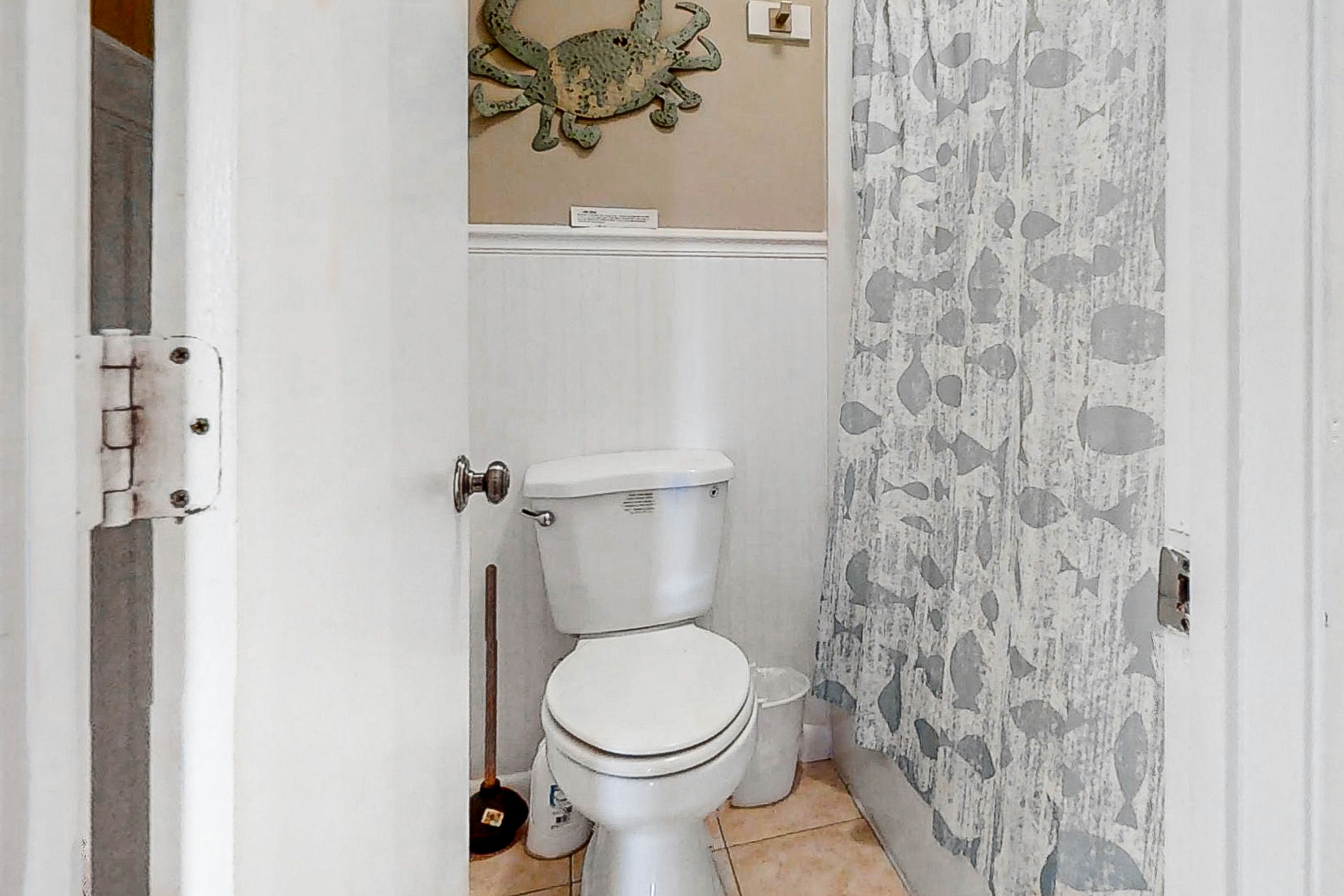 Newly renovated two-story waterfront condo with screened porch, pool, & tennis