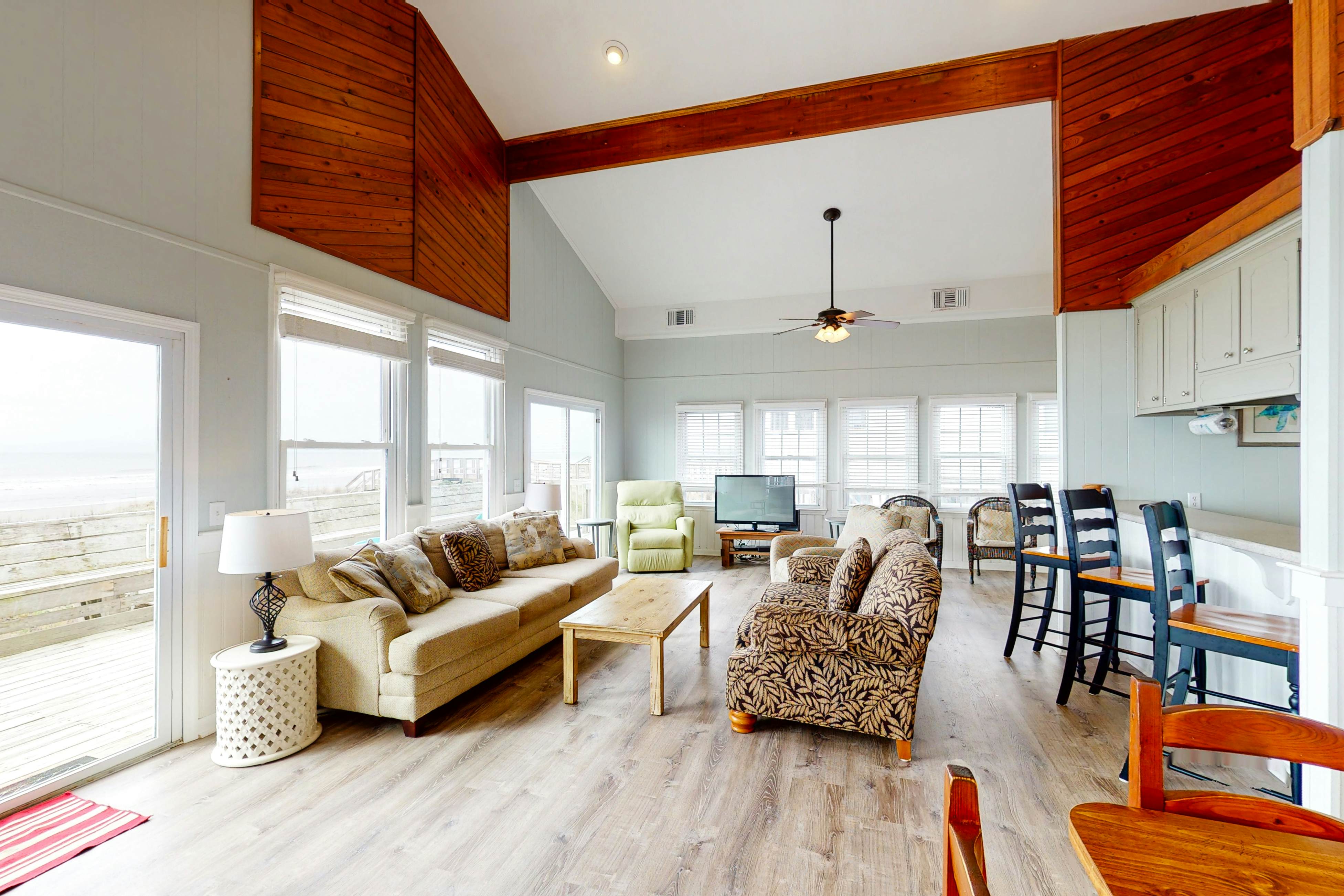 Oceanfront home with WiFi, full kitchen, & deck that spans the side of the home