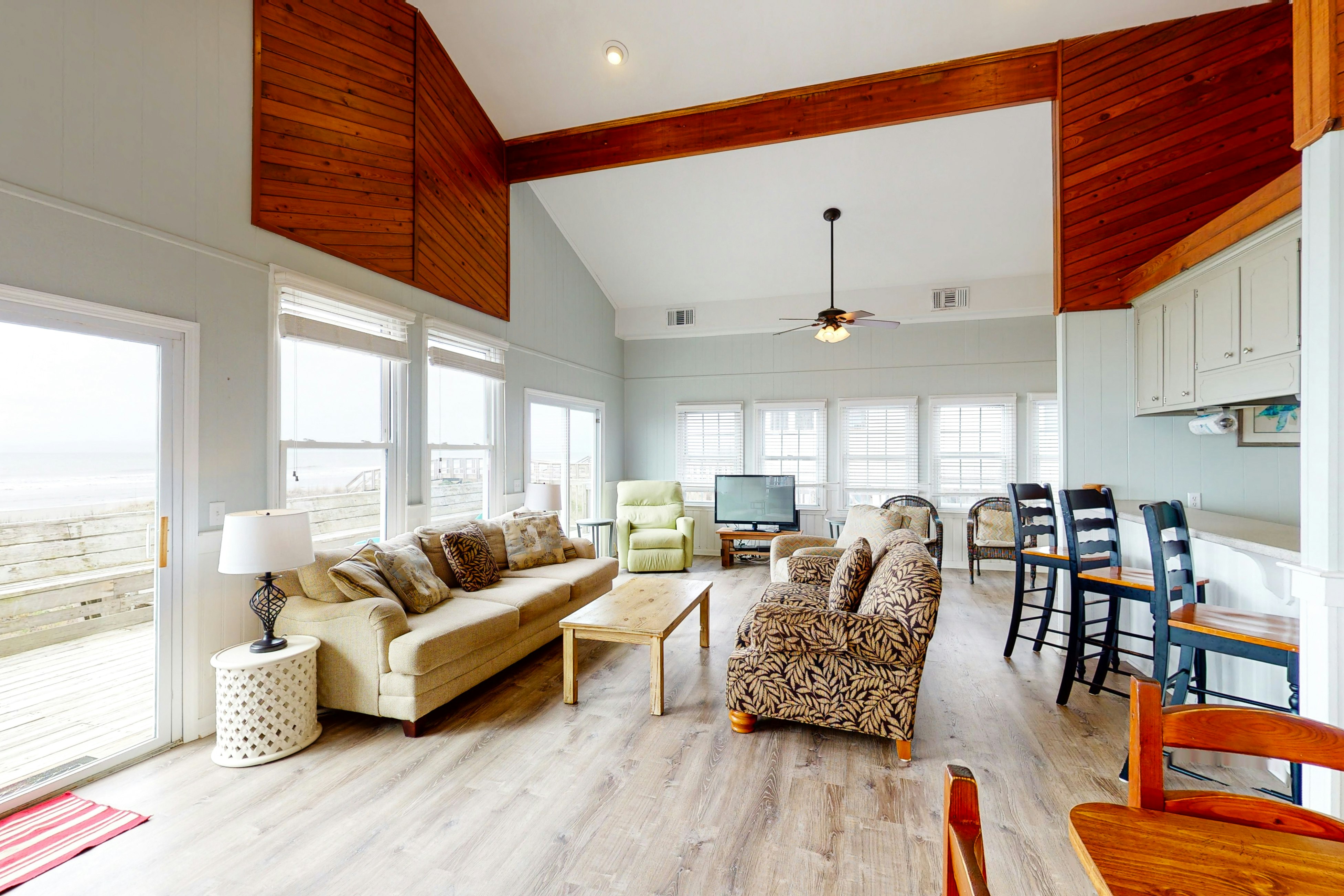 Oceanfront home with WiFi, full kitchen, & deck that spans the side of the home