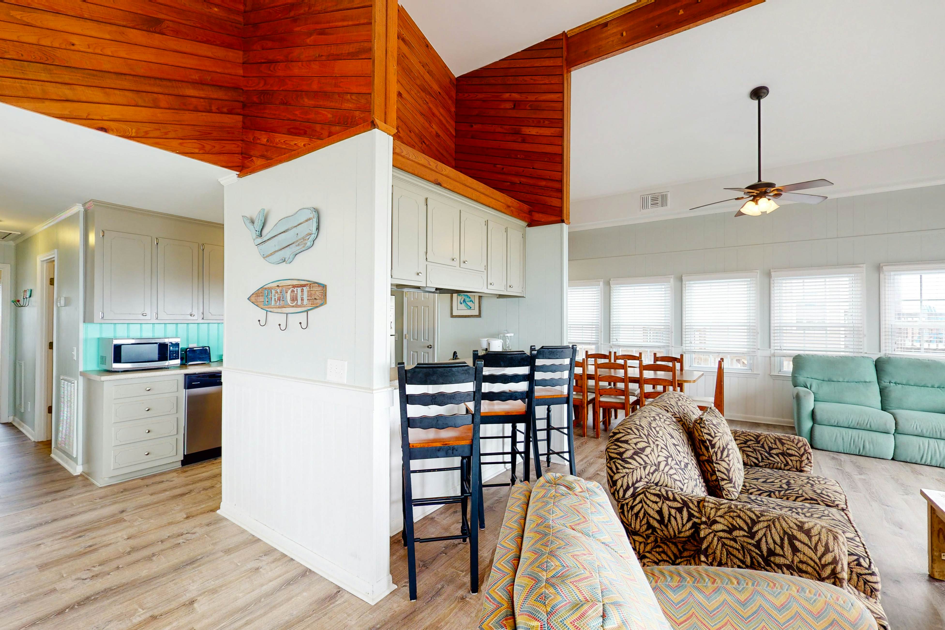 Oceanfront home with WiFi, full kitchen, & deck that spans the side of the home