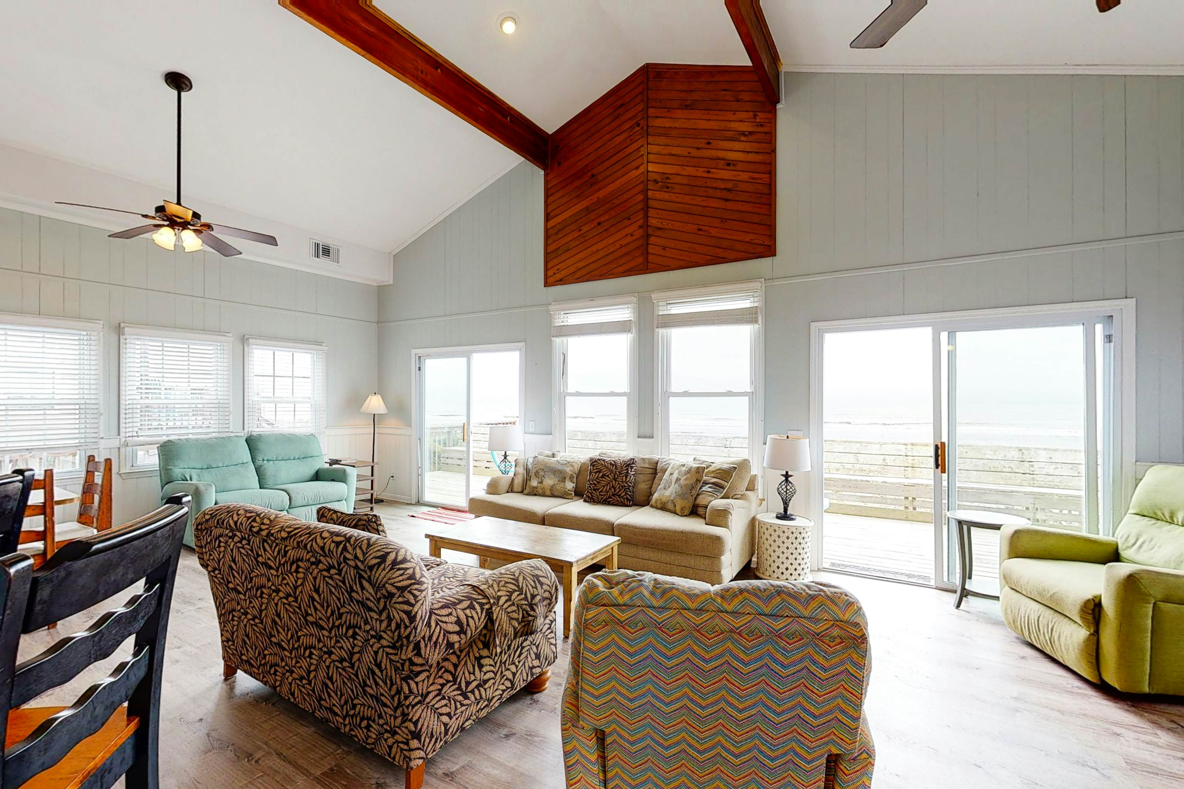Oceanfront home with WiFi, full kitchen, & deck that spans the side of the home