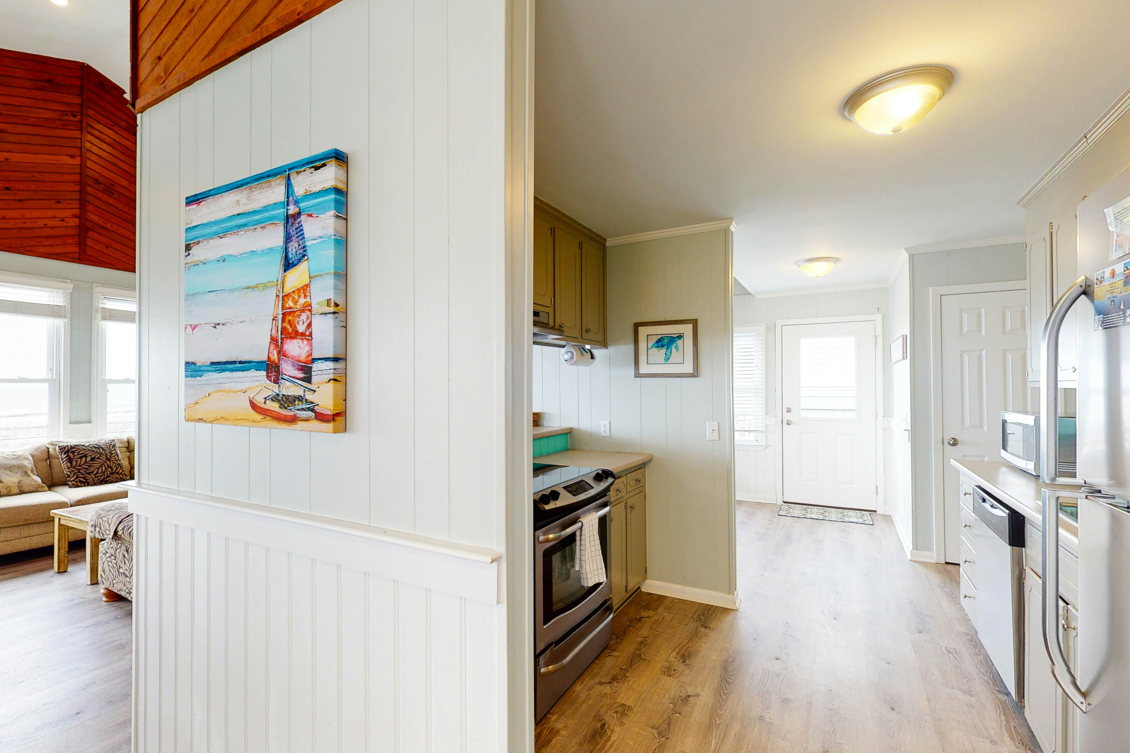 Oceanfront home with WiFi, full kitchen, & deck that spans the side of the home