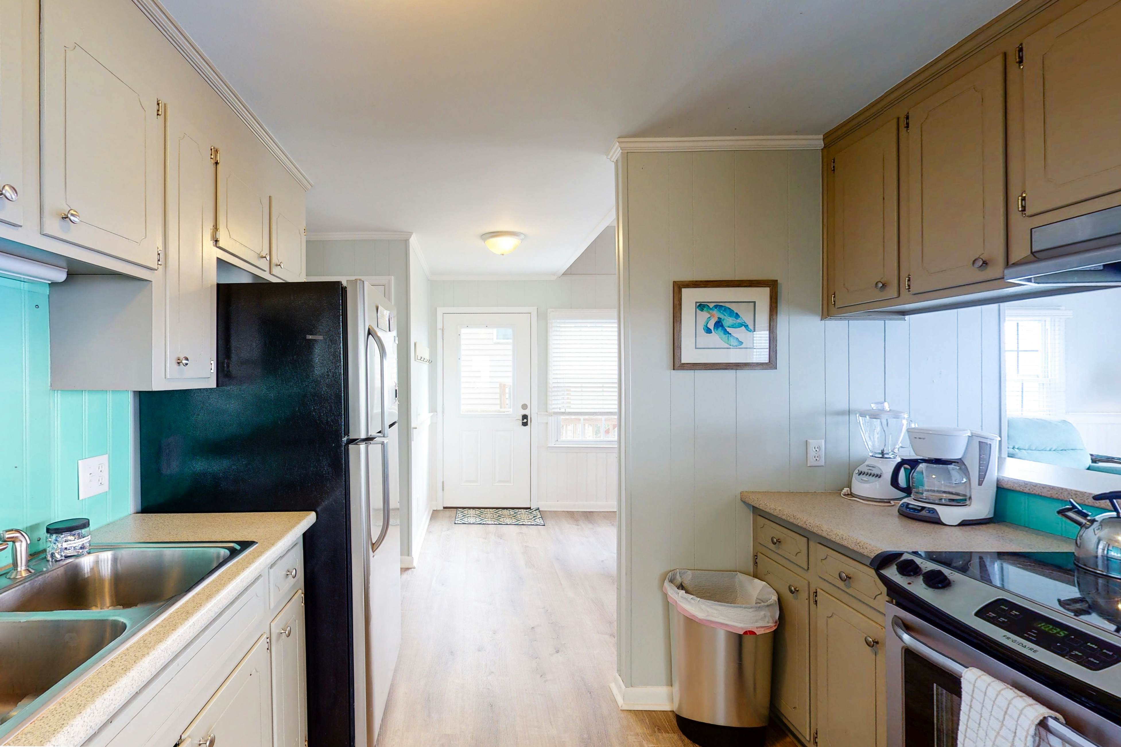 Oceanfront home with WiFi, full kitchen, & deck that spans the side of the home