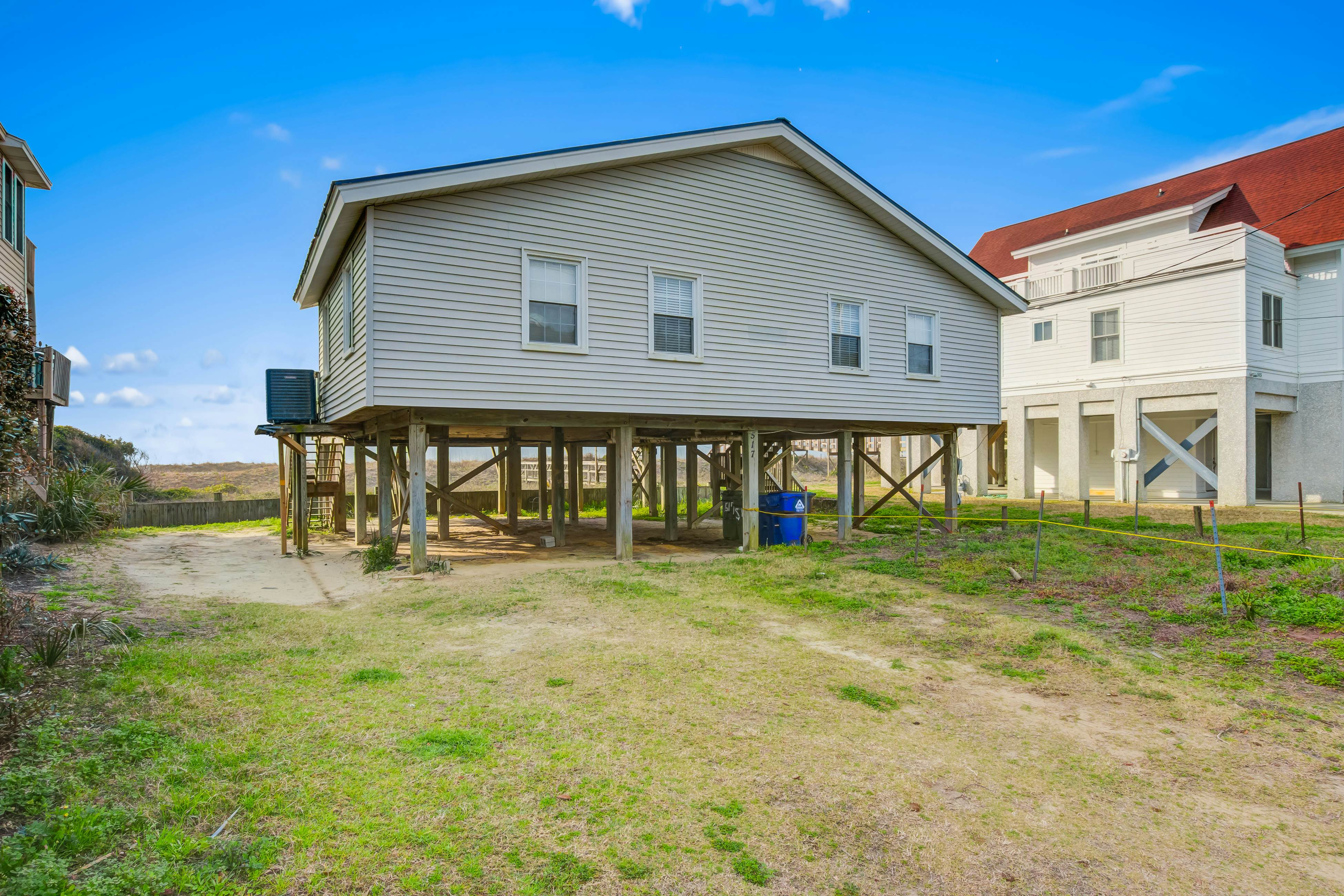 Oceanfront home with WiFi, full kitchen, & deck that spans the side of the home