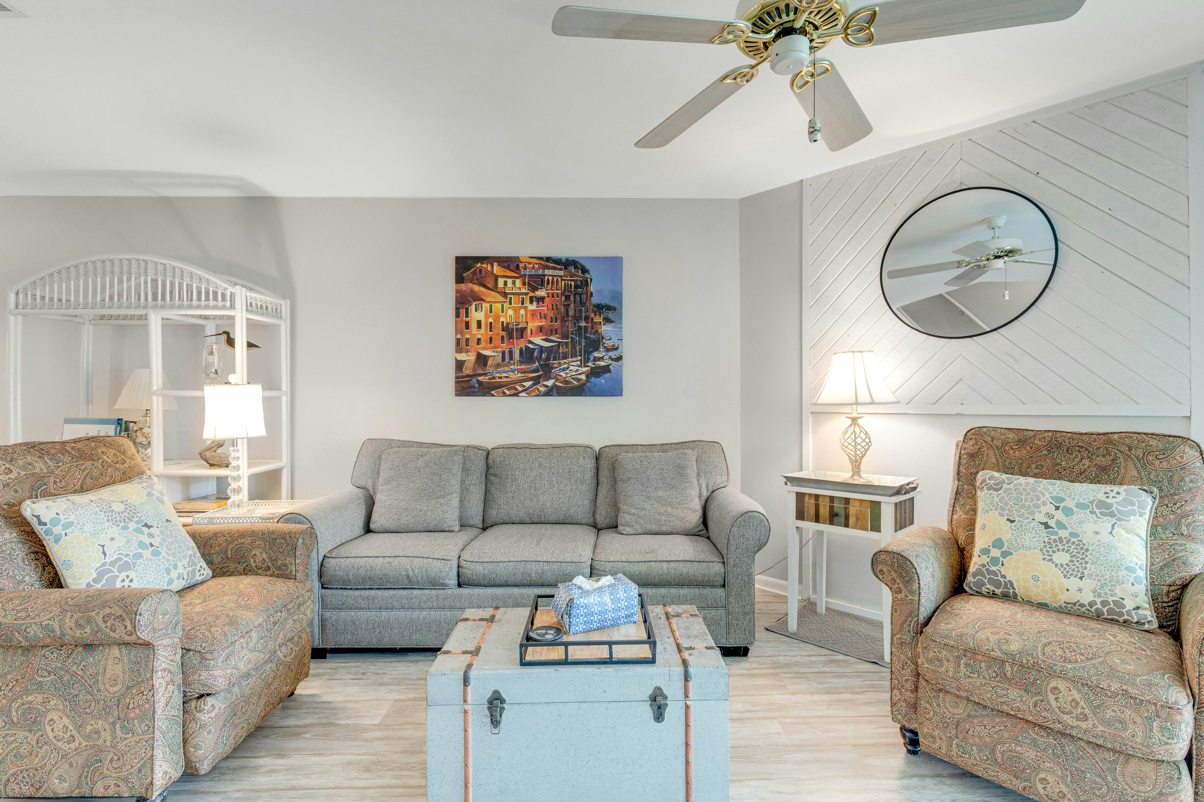 Second-floor villa w/ river views & community pool, tennis courts, and dock