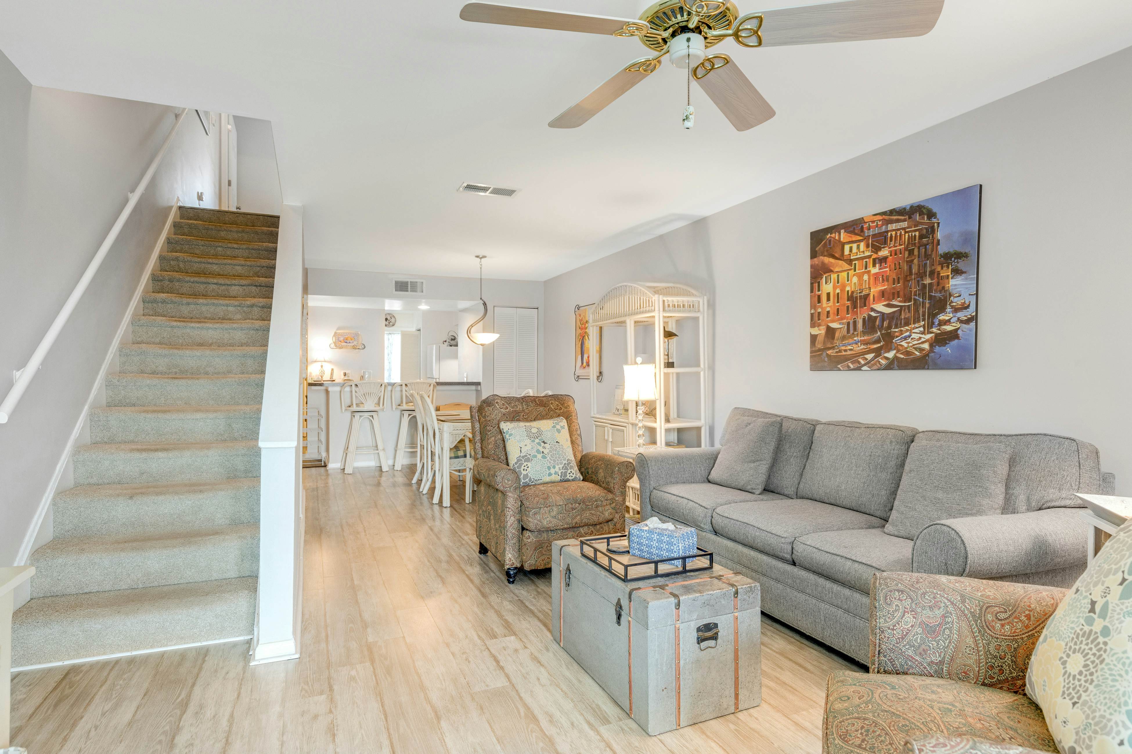 Second-floor villa w/ river views & community pool, tennis courts, and dock