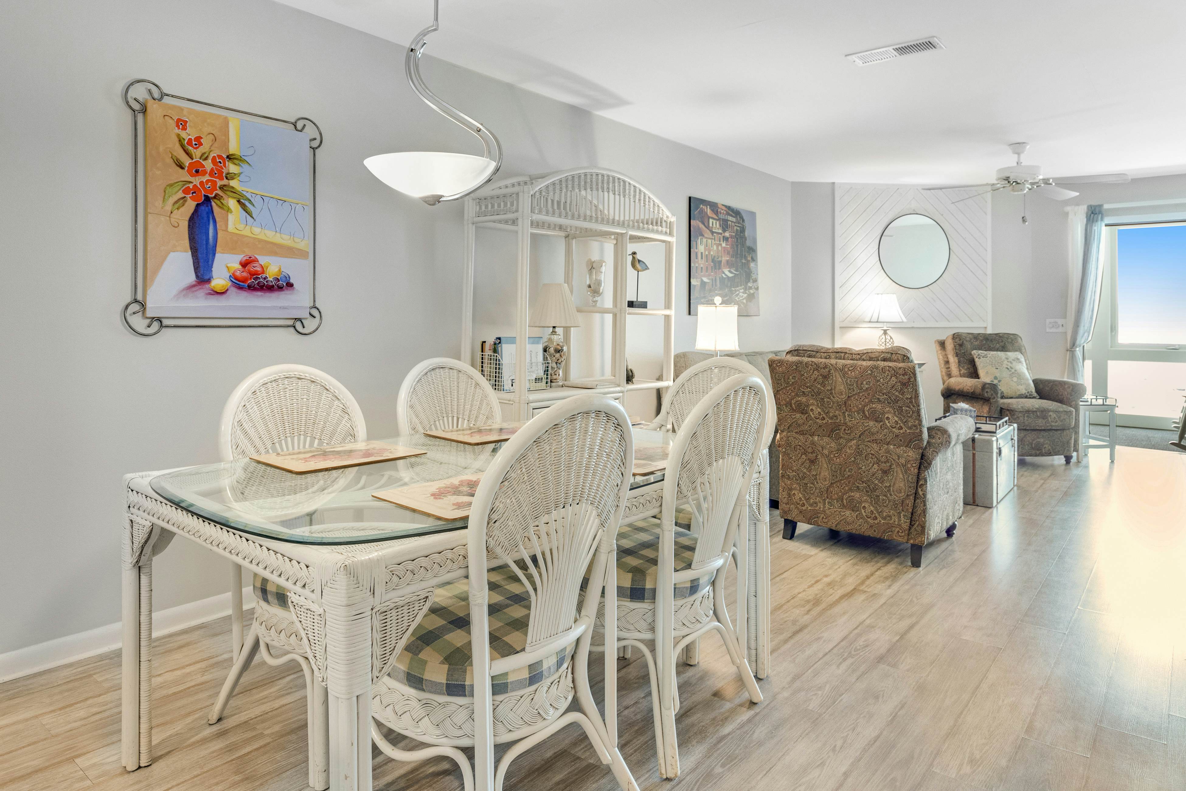 Second-floor villa w/ river views & community pool, tennis courts, and dock