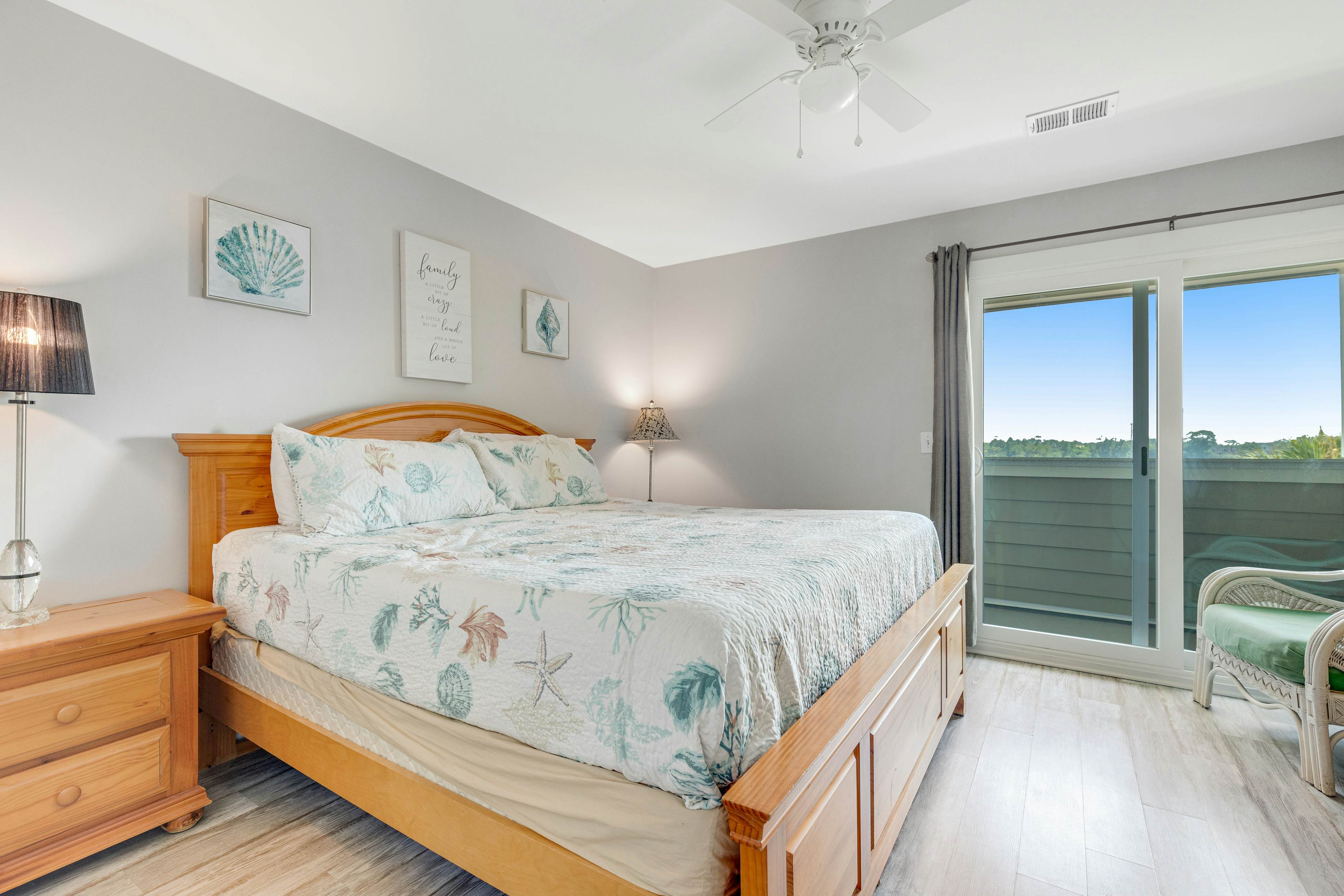 Second-floor villa w/ river views & community pool, tennis courts, and dock